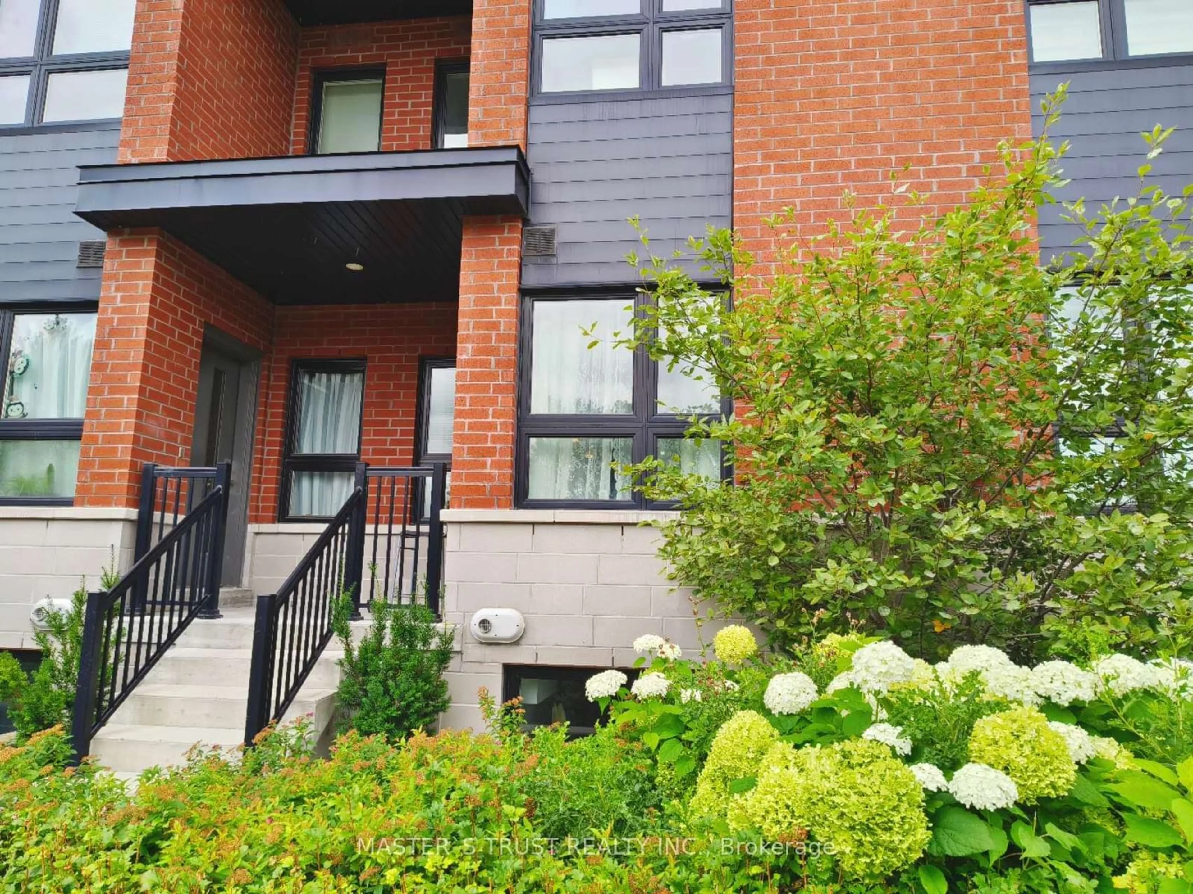 Home with brick exterior material, street for 2100 BRIDLETOWNE Circ #110, Toronto Ontario M1W 0A6