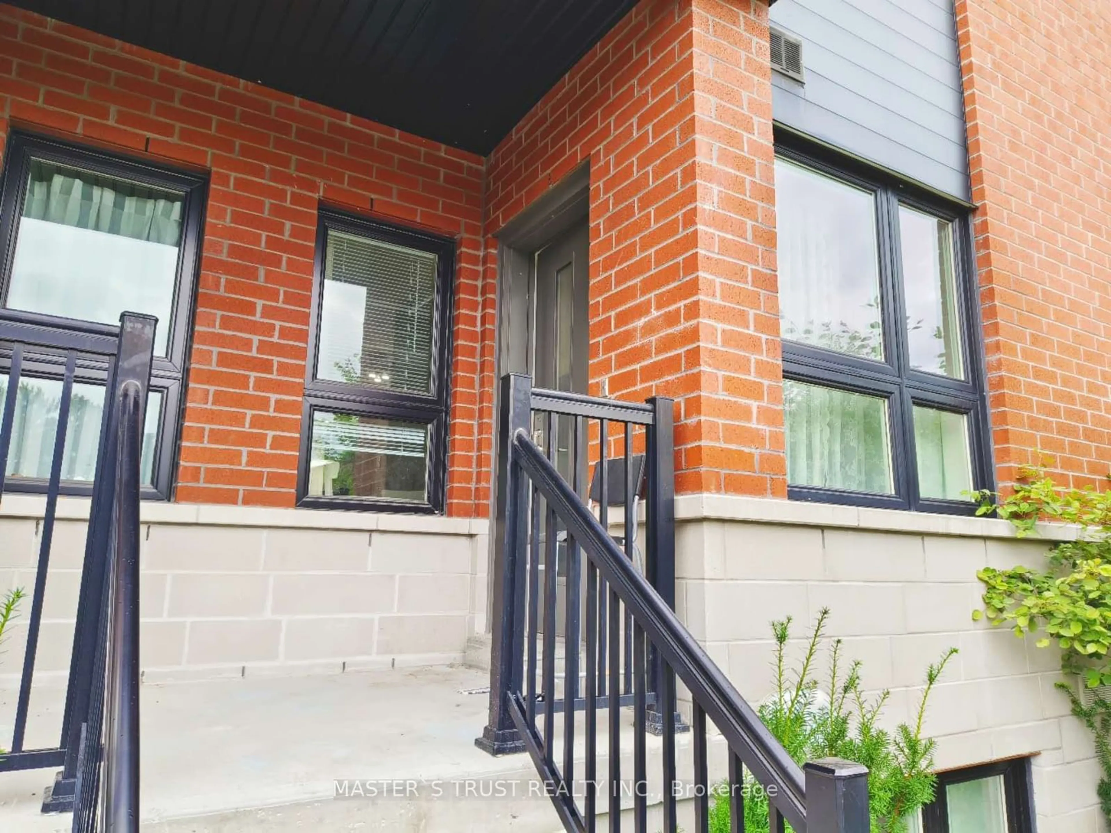 Home with brick exterior material, street for 2100 BRIDLETOWNE Circ #110, Toronto Ontario M1W 0A6