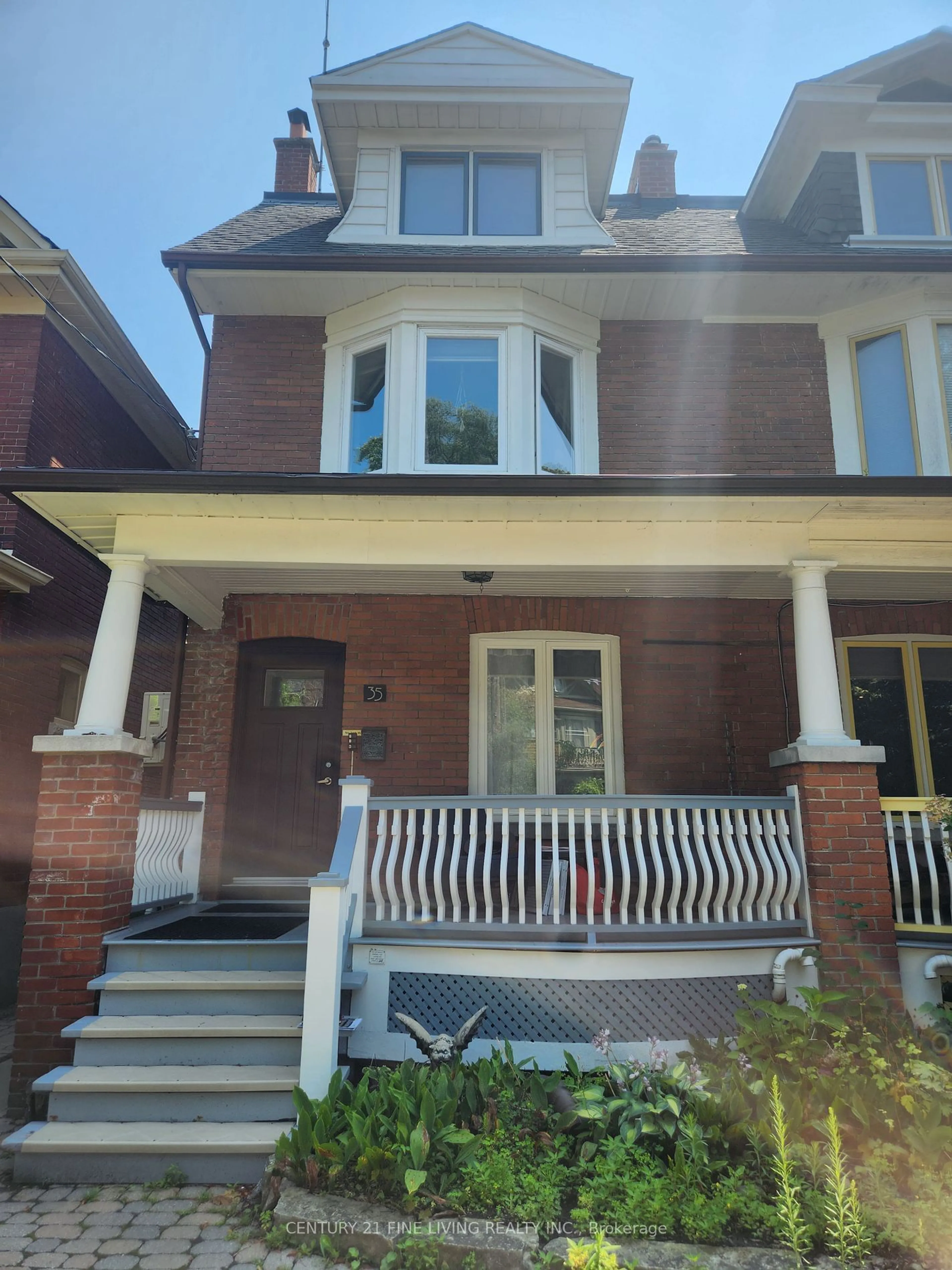 Home with brick exterior material, street for 35 Columbine Ave, Toronto Ontario M4L 1P4