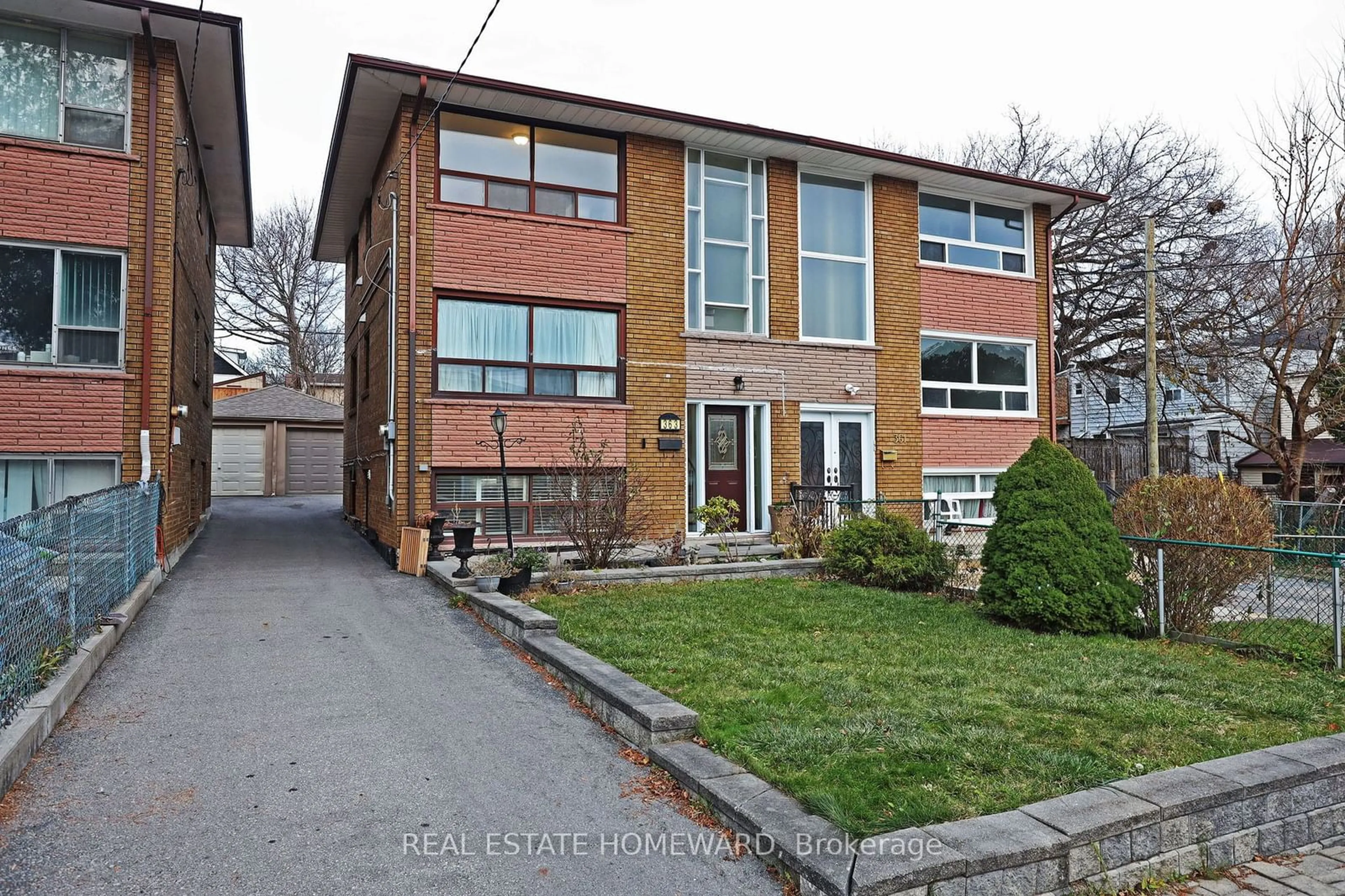 Home with brick exterior material, street for 363 Highfield Rd, Toronto Ontario M4L 2V7