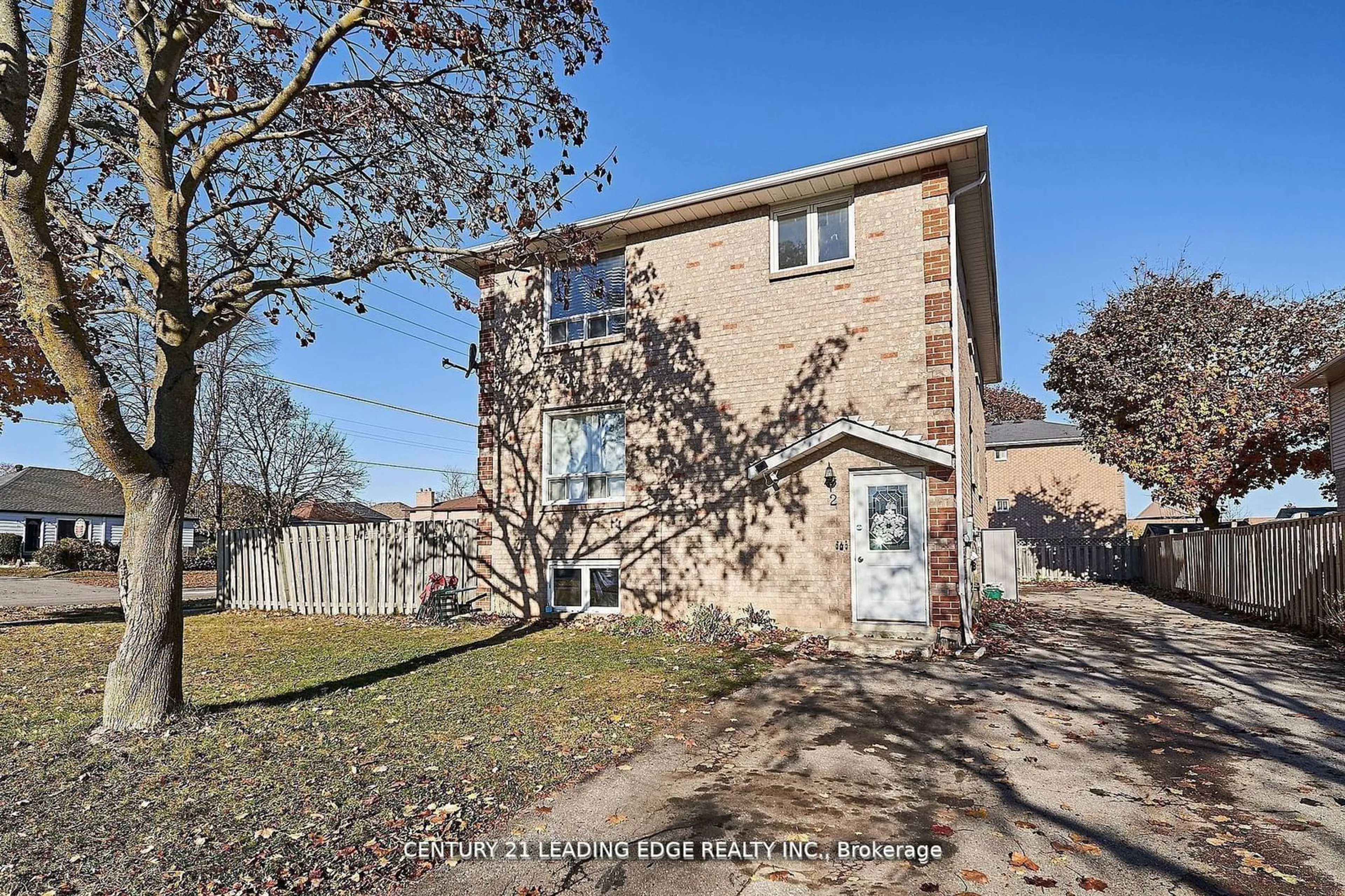 Home with brick exterior material, street for 2 Kingsway Gate, Clarington Ontario N8M 3C2