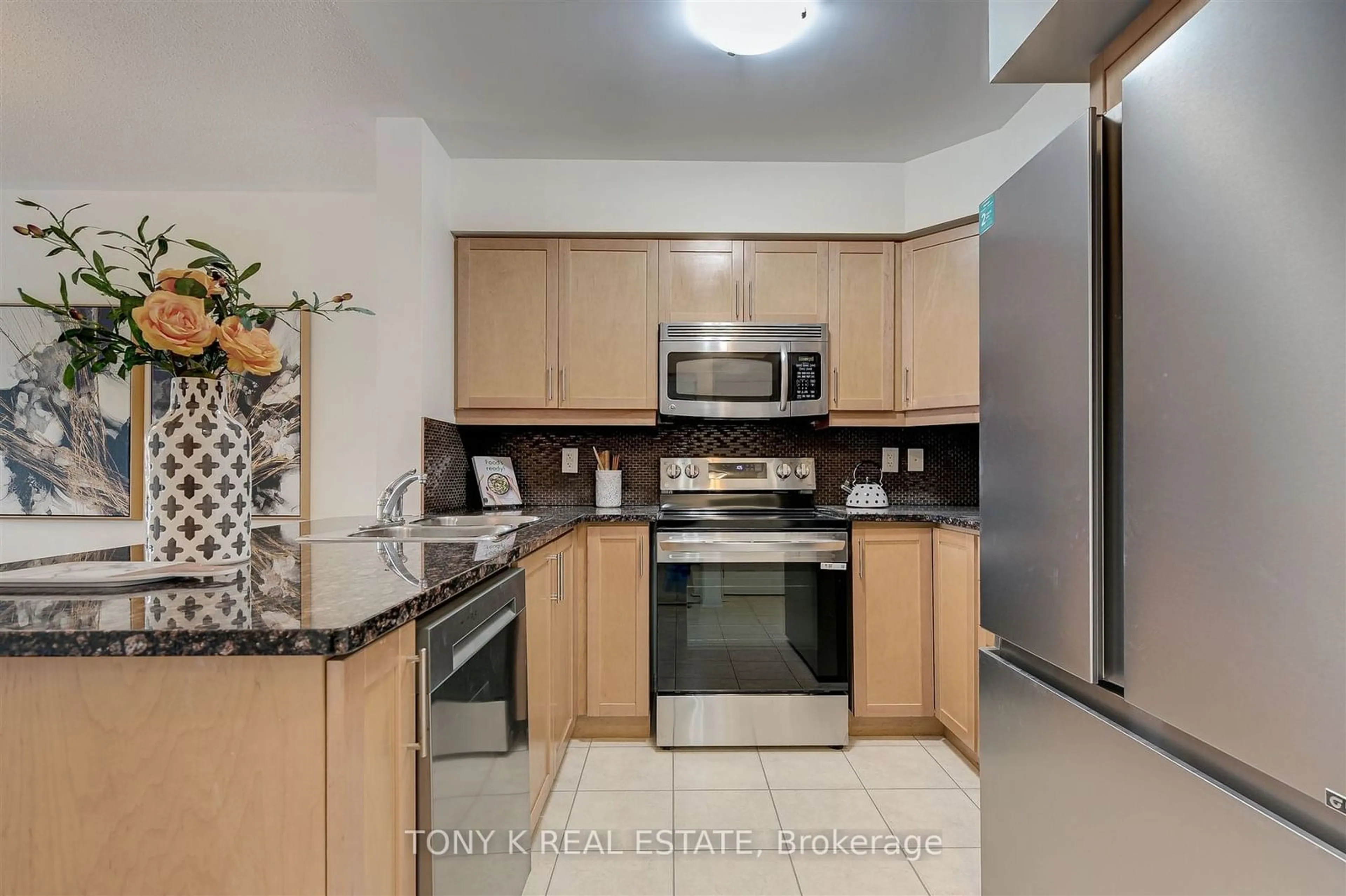 Standard kitchen, ceramic/tile floor for 60 Mendelssohn St #302, Toronto Ontario M1L 0G9