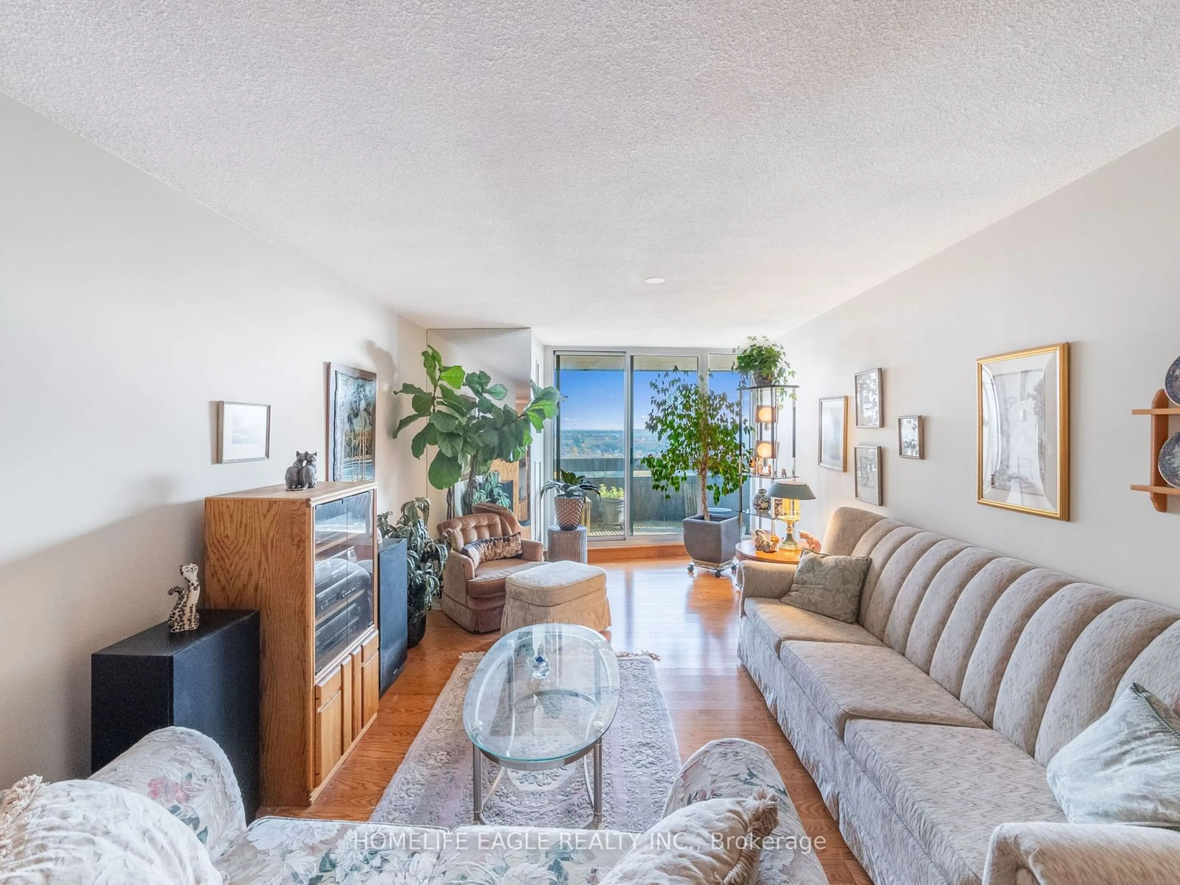 Living room with furniture, unknown for 3131 Bridletowne Circ #1904, Toronto Ontario M1W 2S9