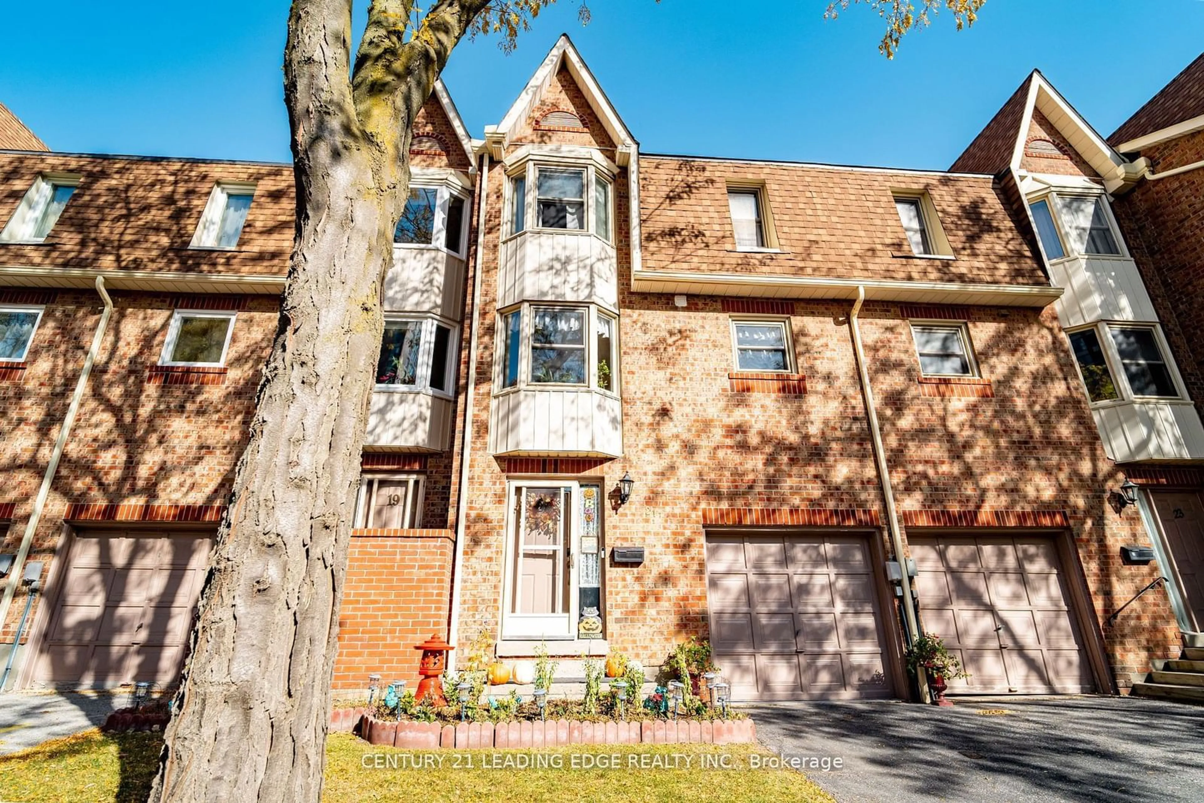 Home with brick exterior material, street for 25 Cardwell Ave #21, Toronto Ontario M1S 4Y8