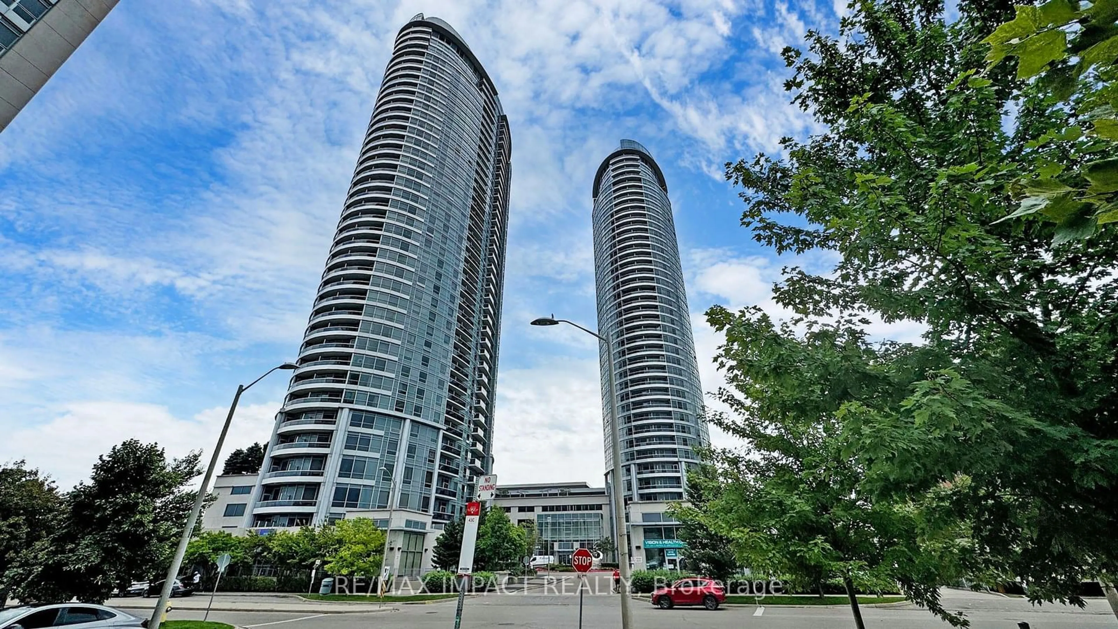 A pic from outside/outdoor area/front of a property/back of a property/a pic from drone, city buildings view from balcony for 125 Village Green Sq #2212, Toronto Ontario M1S 0G3