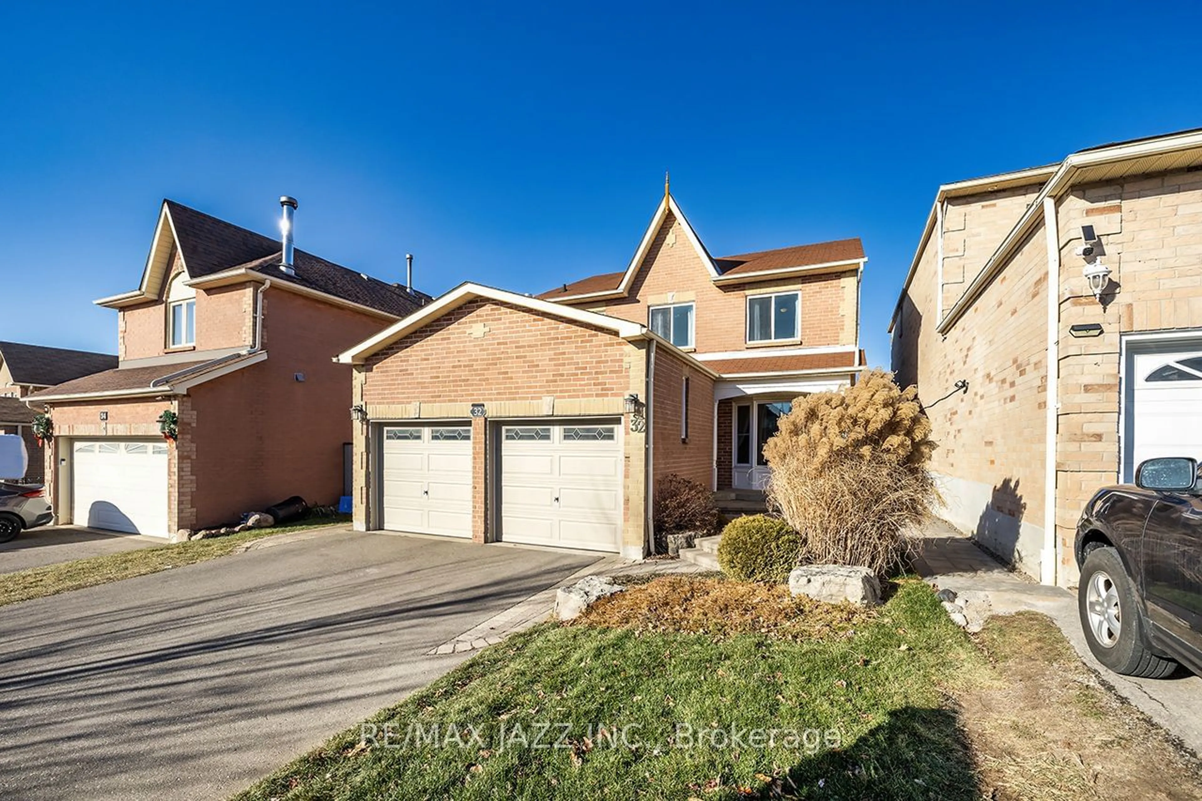 Home with brick exterior material, street for 32 Parkins Dr, Ajax Ontario L1T 3L2