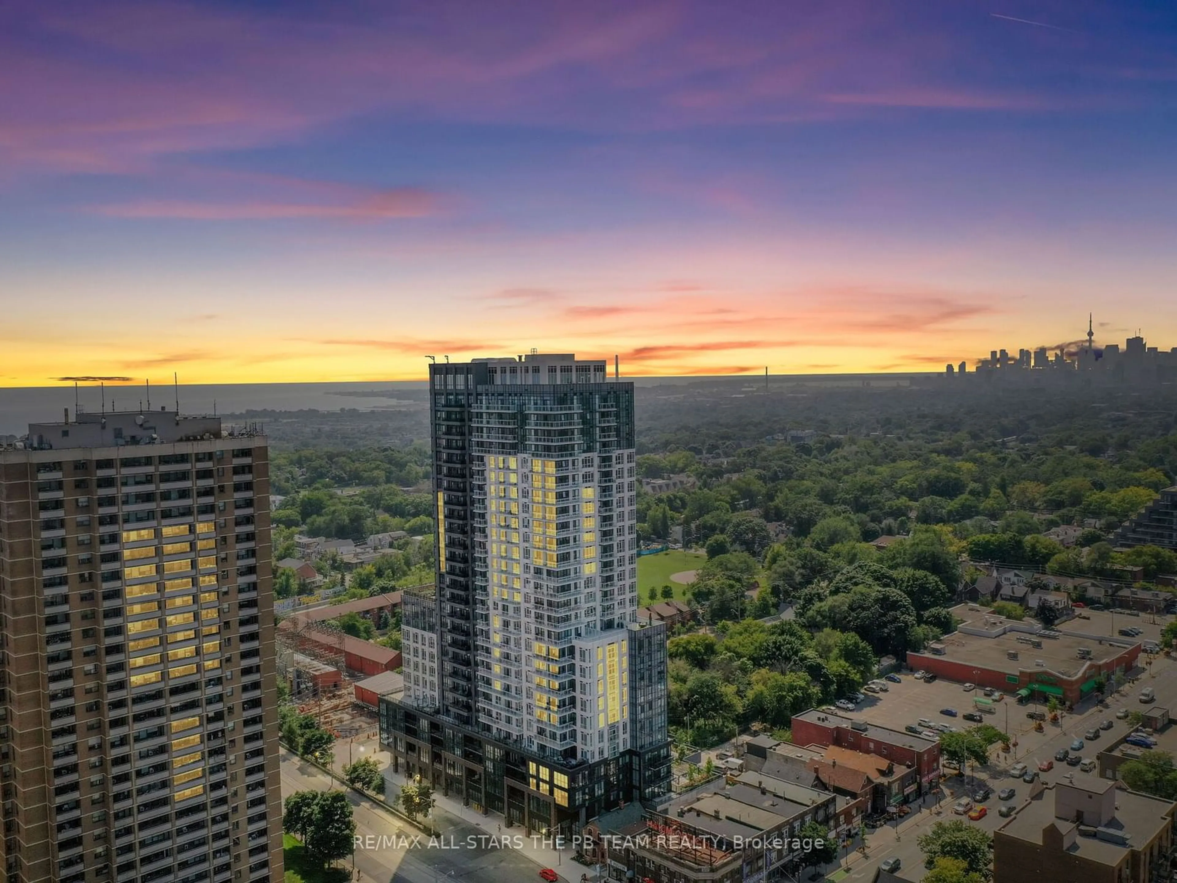 A pic from outside/outdoor area/front of a property/back of a property/a pic from drone, city buildings view from balcony for 286 Main St #2301, Toronto Ontario M4C 0B3