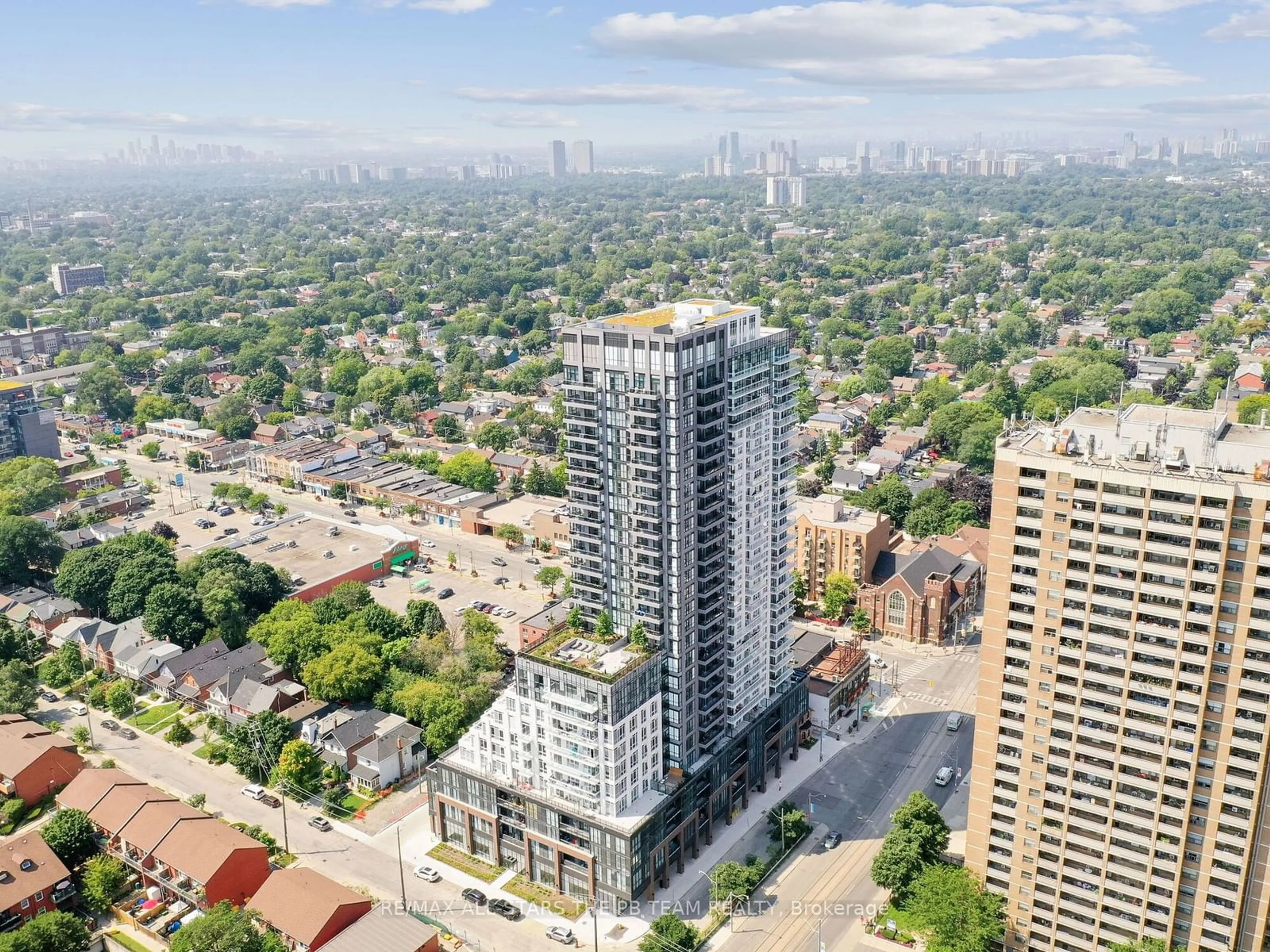 A pic from outside/outdoor area/front of a property/back of a property/a pic from drone, city buildings view from balcony for 286 Main St #2301, Toronto Ontario M4C 0B3