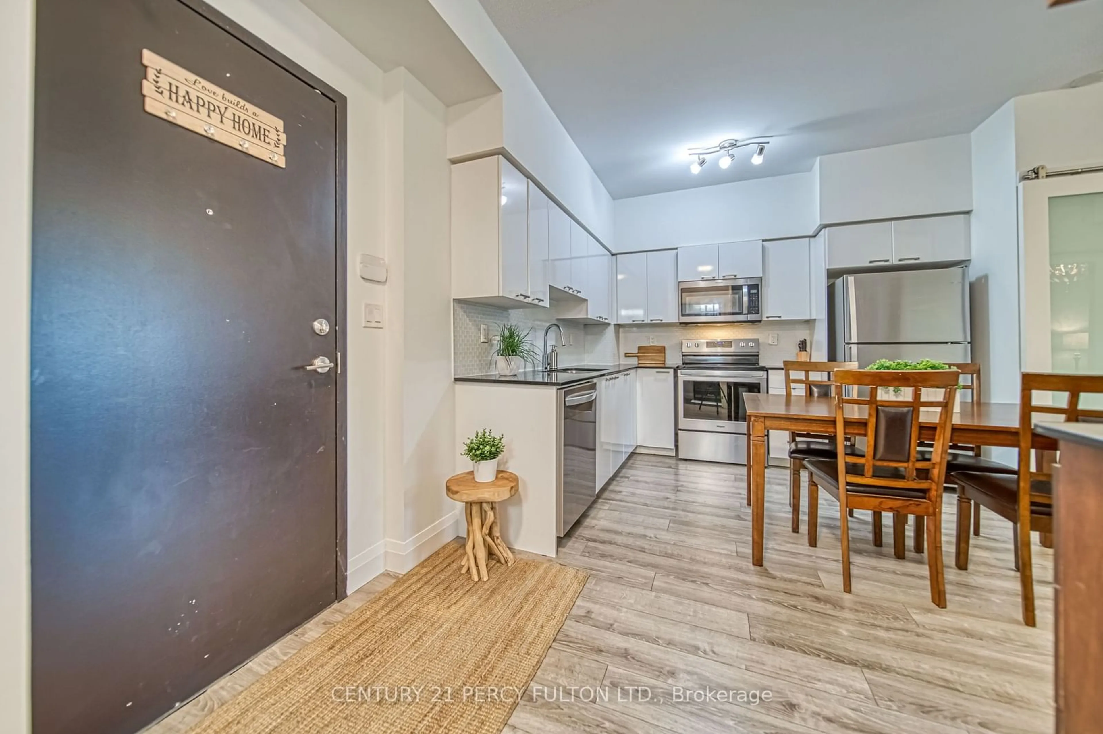 Open concept kitchen, unknown for 2150 Lawrence Ave #205, Toronto Ontario M1R 3A7