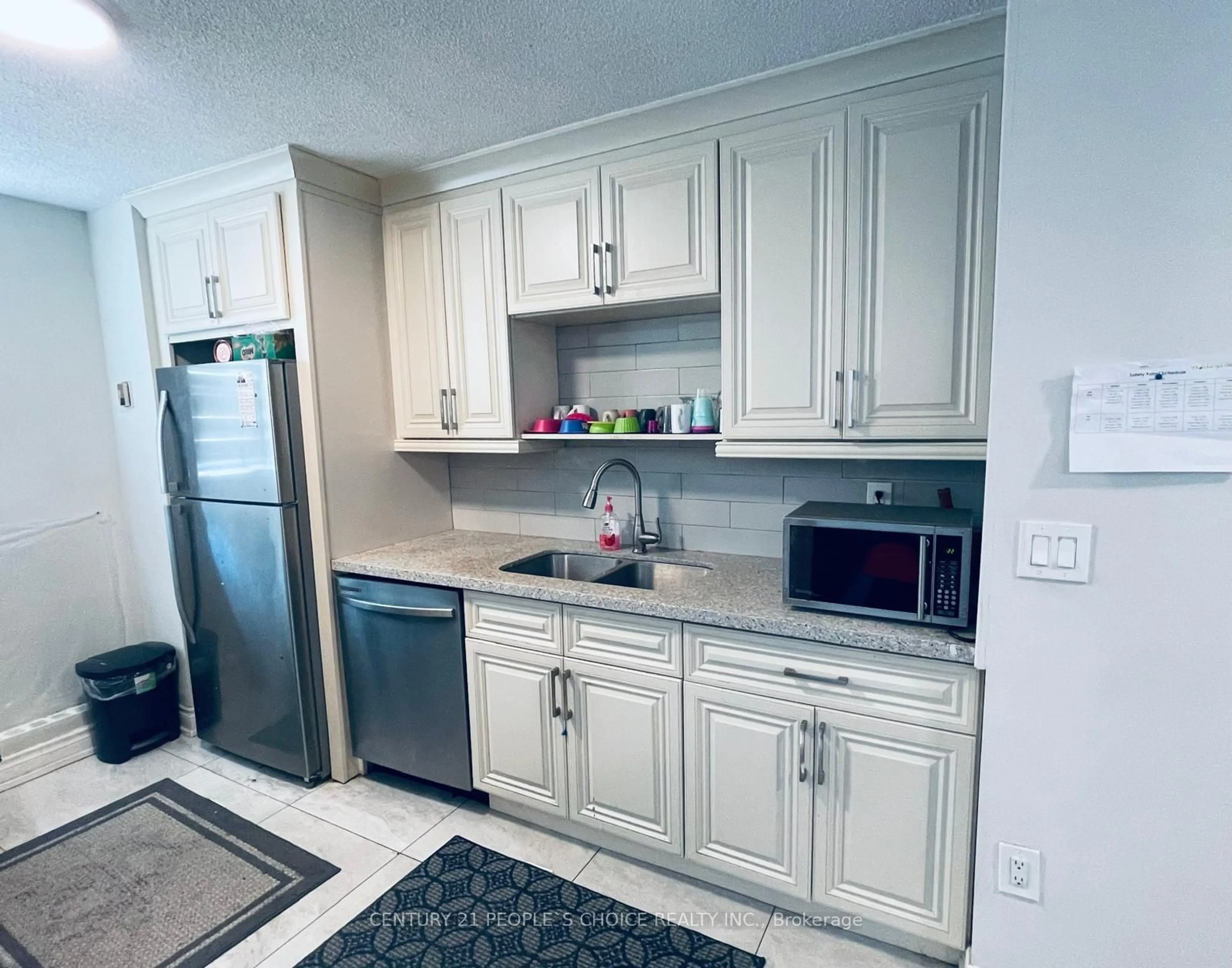 Standard kitchen, unknown for 100 Wingarden Crt #216, Toronto Ontario M1B 2P4