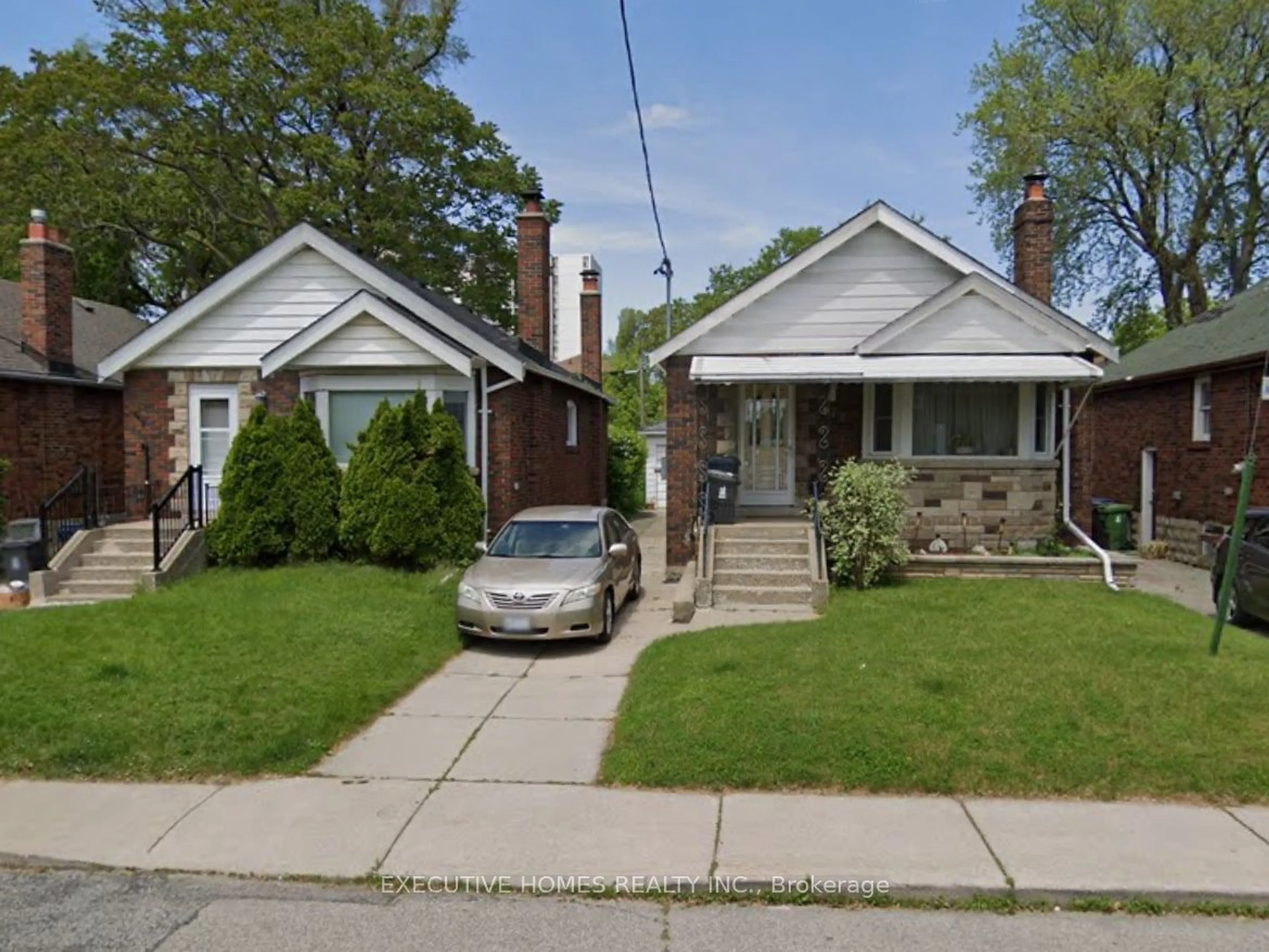 Home with brick exterior material, street for 270-272 Floyd Ave, Toronto Ontario M4J 2J3