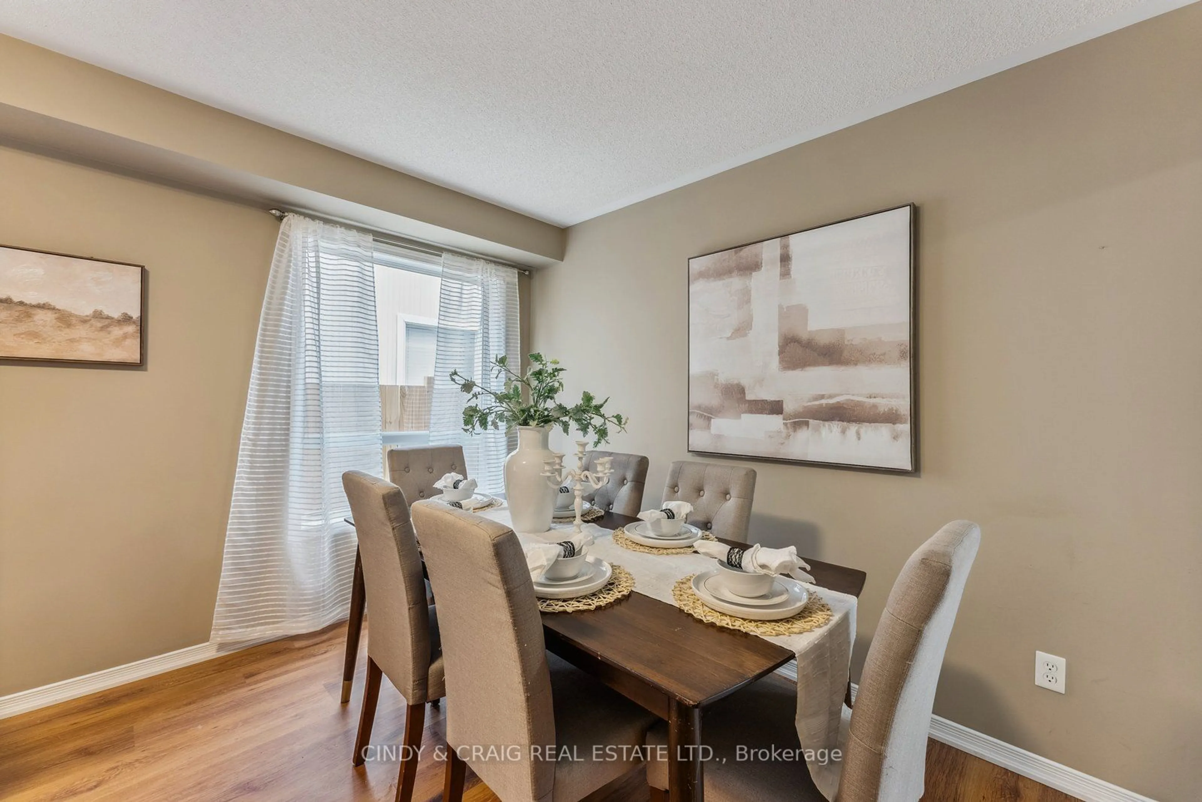 Dining room, wood/laminate floor for 1555 Glenbourne Dr, Oshawa Ontario L1K 0M3