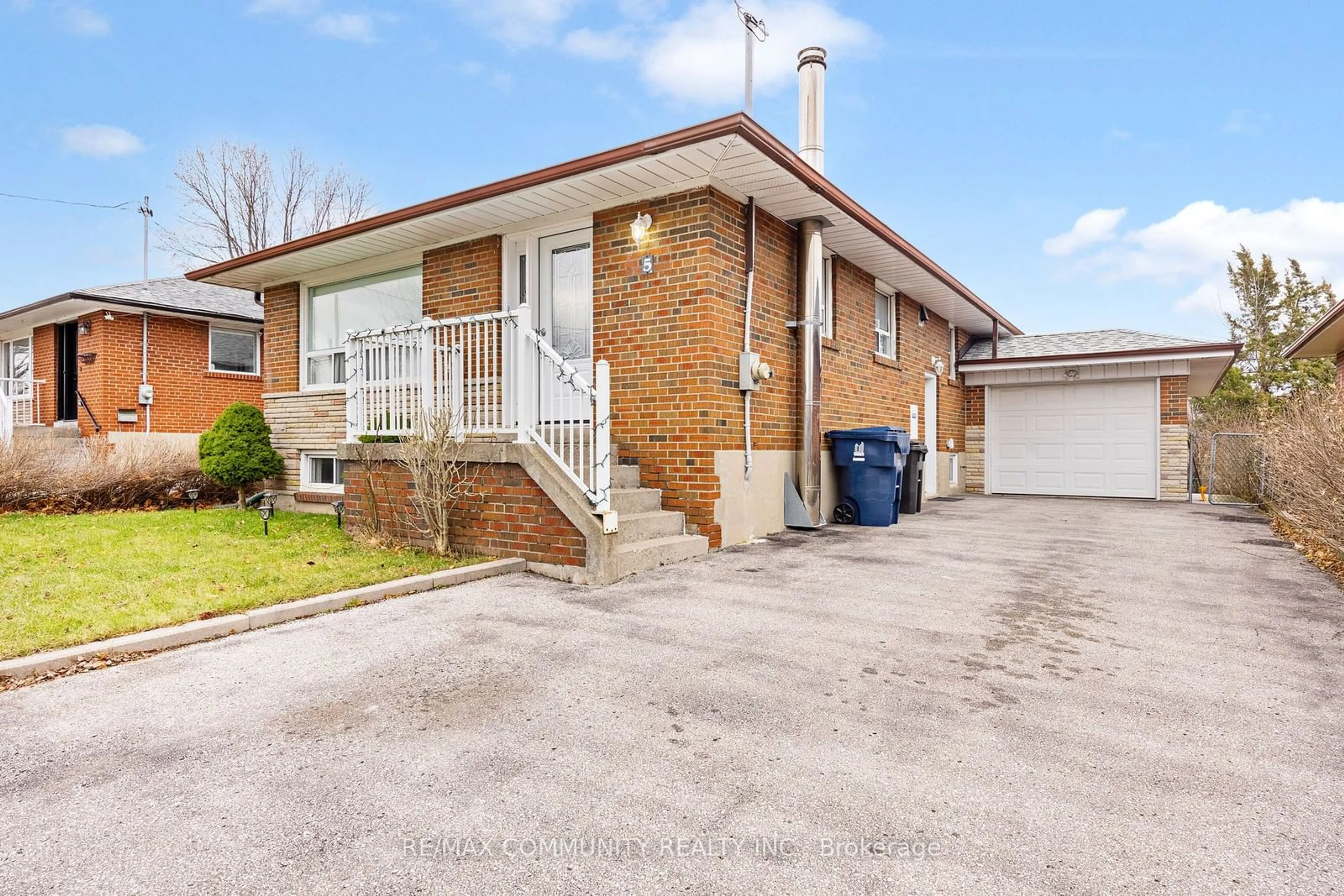 Home with brick exterior material, street for 5 Woolwick Dr, Toronto Ontario M1H 2H9