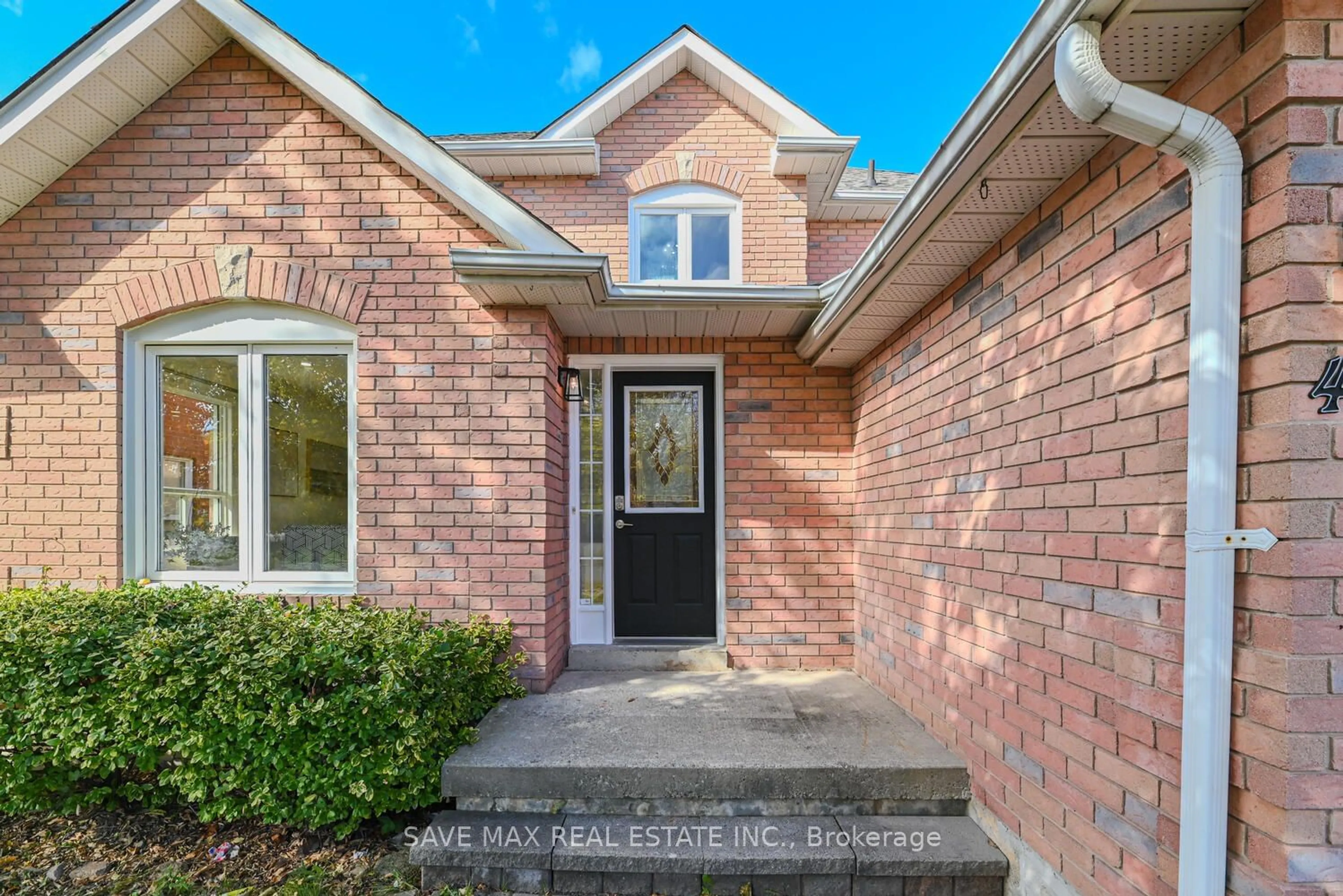 Home with brick exterior material, street for 40 Eric Clarke Dr, Whitby Ontario L1R 2H7