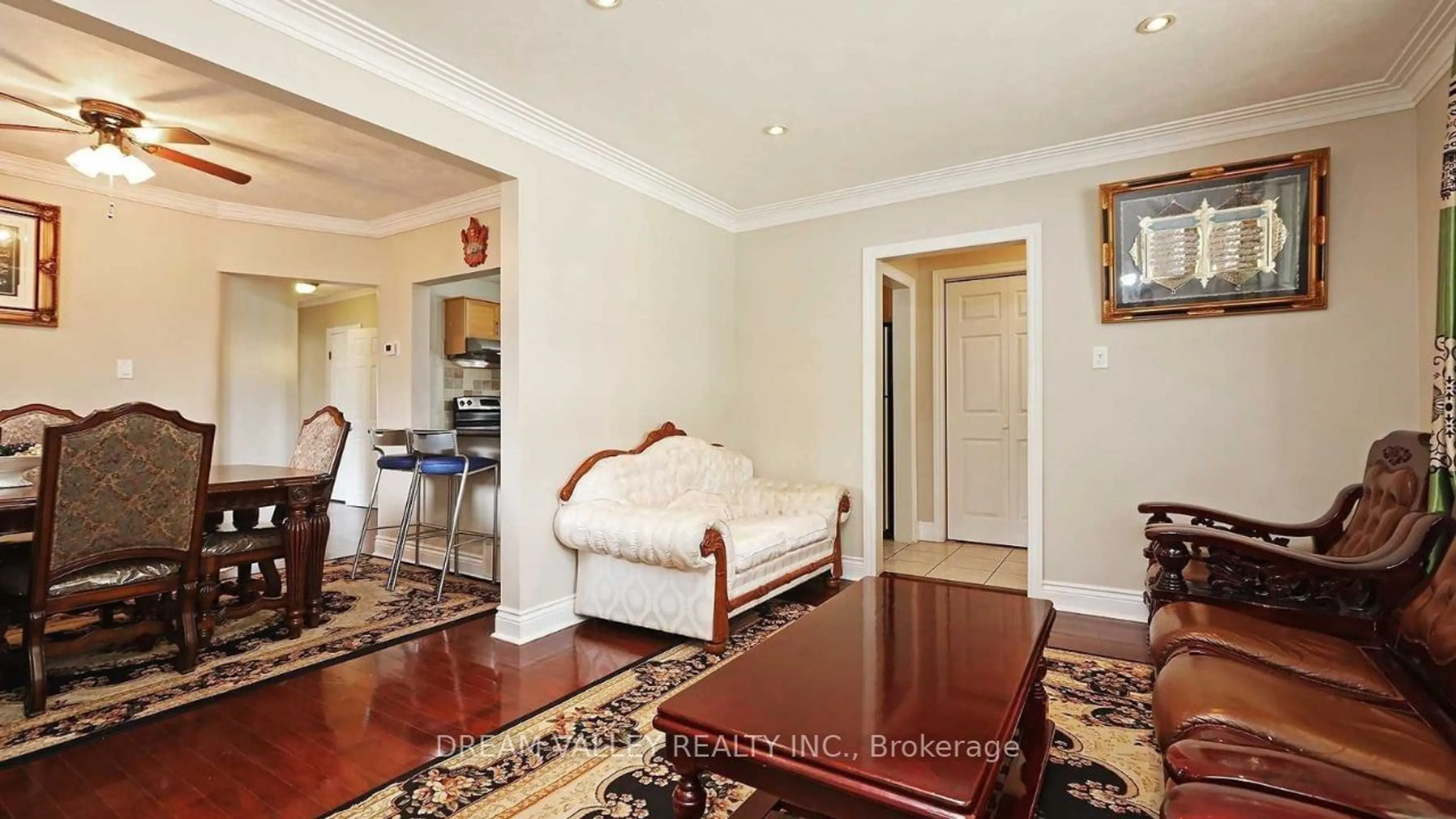 Living room with furniture, wood/laminate floor for 55 Colonial Ave, Toronto Ontario M1M 2C4