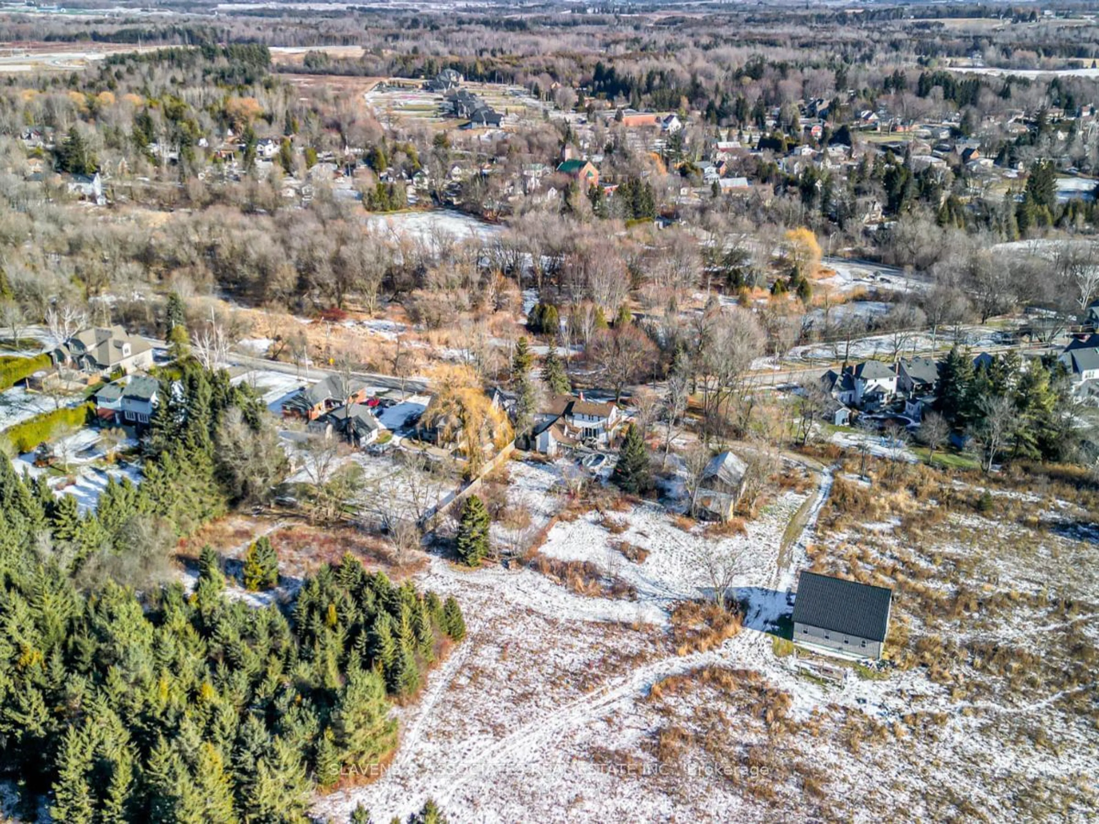 A pic from outside/outdoor area/front of a property/back of a property/a pic from drone, forest/trees view for 136 King Lane, Clarington Ontario L0B 1J0