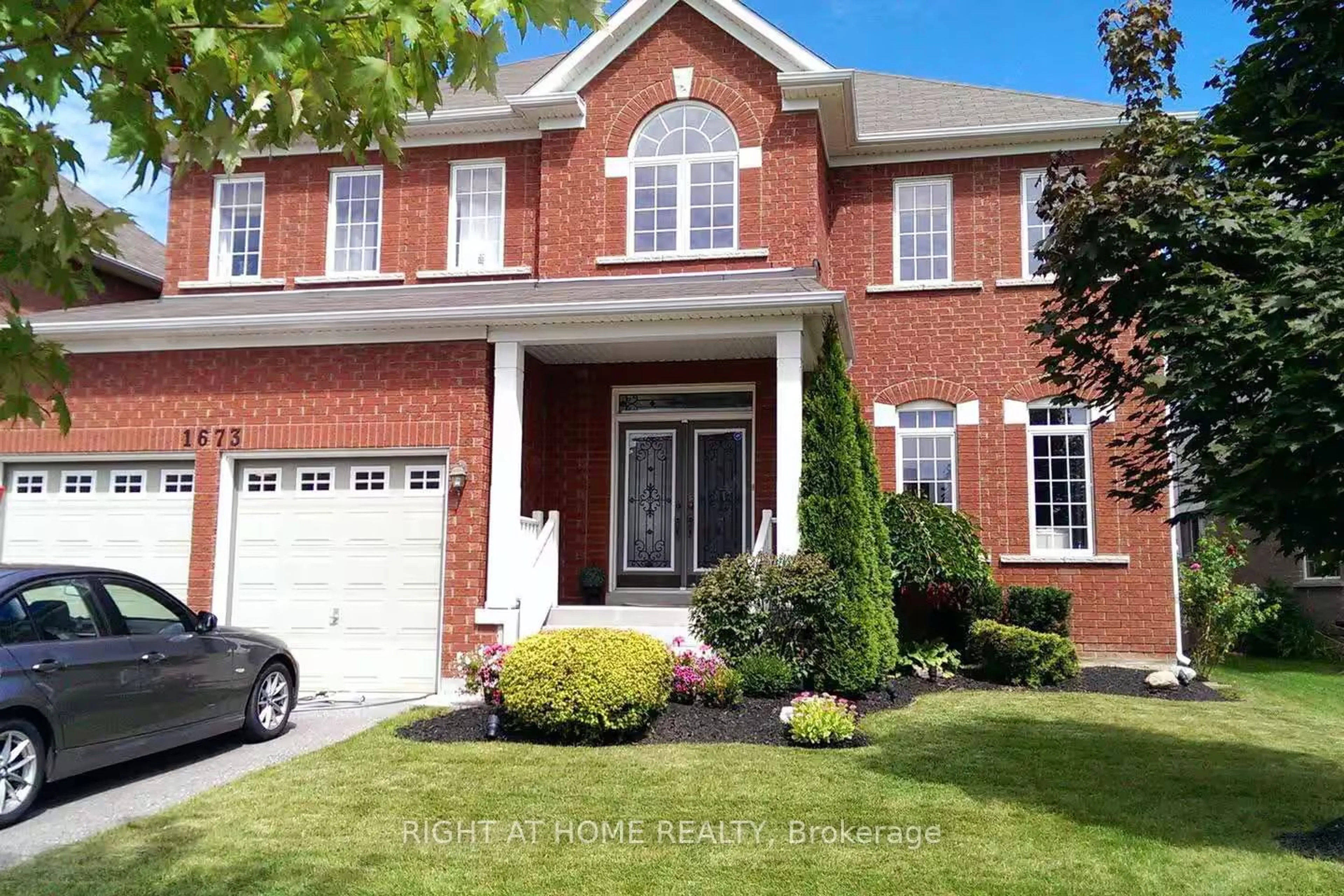 Home with brick exterior material, street for 1673 Ballantrae Dr, Oshawa Ontario L1K 0B1