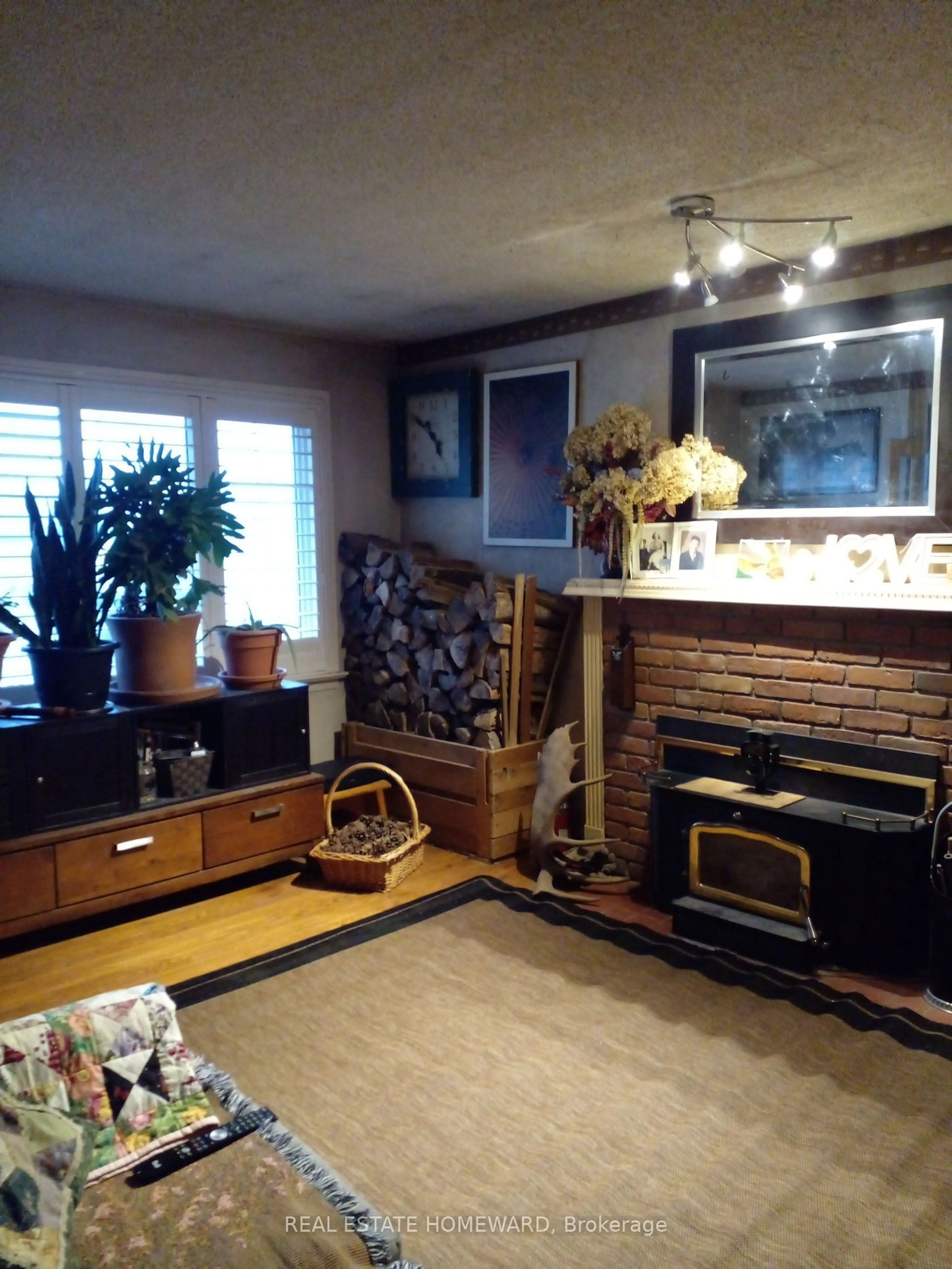 Living room with furniture, wood/laminate floor for 106 Easthaven St, Oshawa Ontario L1G 6K3