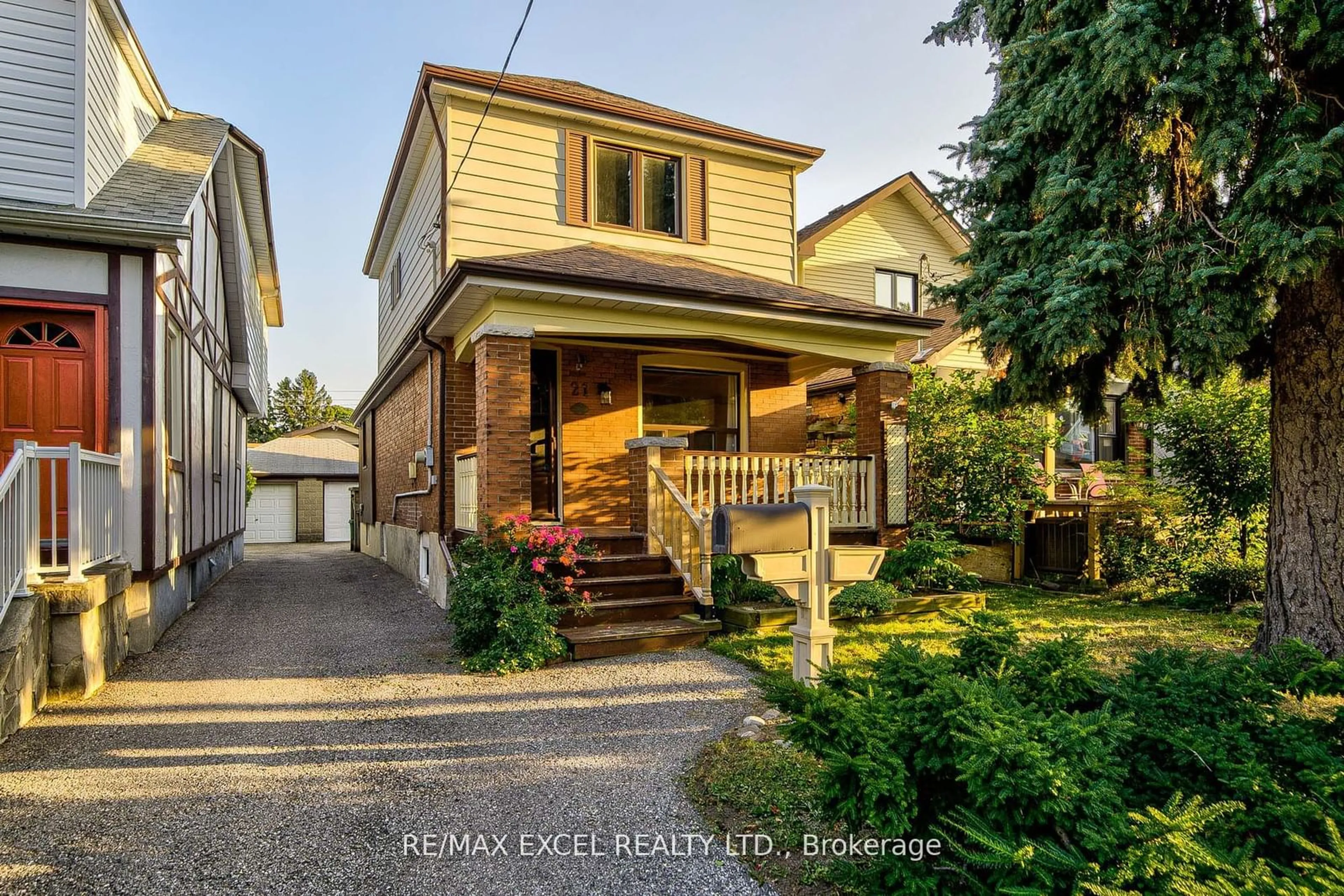 Home with brick exterior material, street for 21 Savoy Ave, Toronto Ontario M4C 2X4