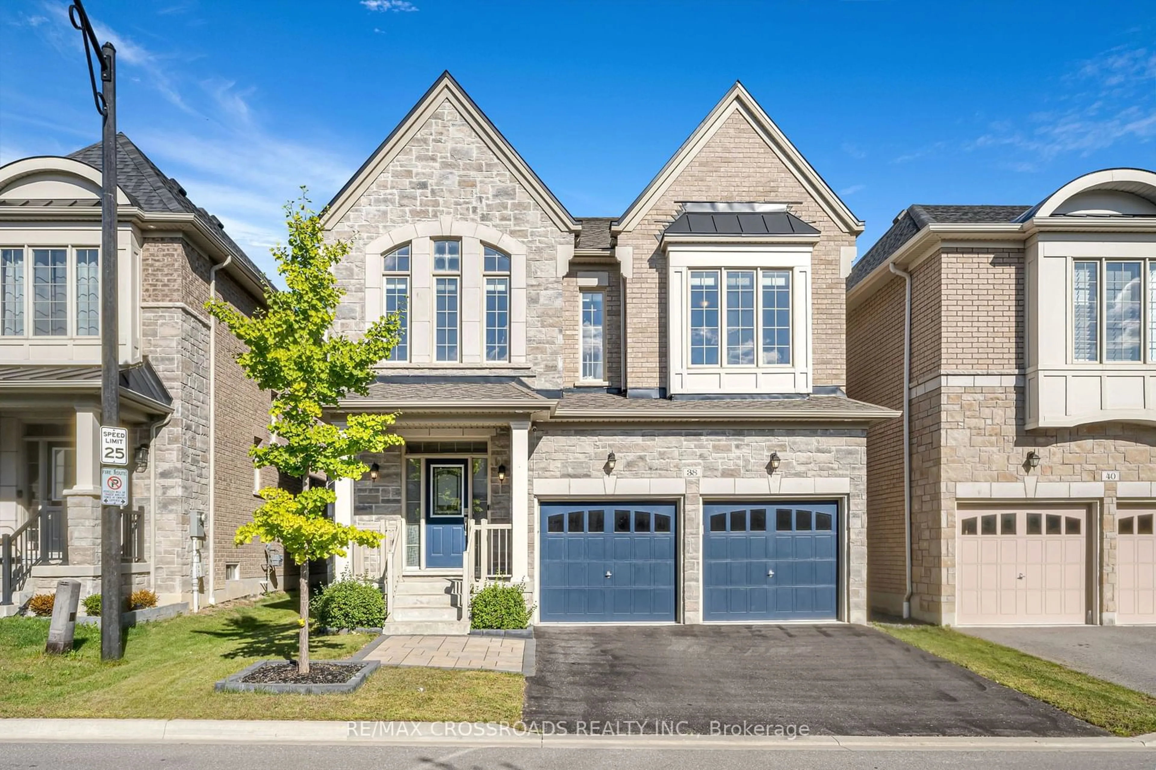 Home with brick exterior material, street for 38 Coates Of Arms Lane, Ajax Ontario L1T 3S2