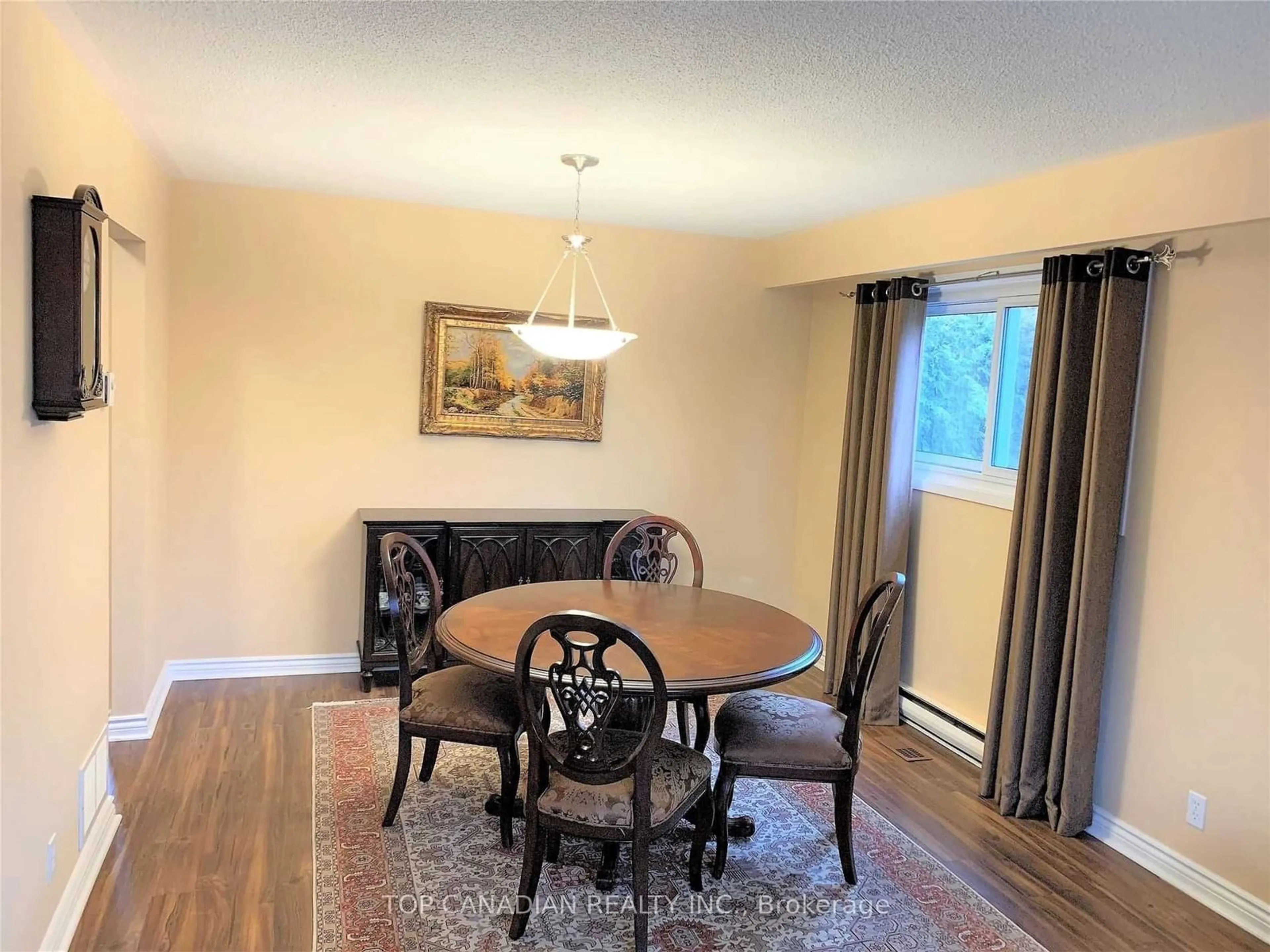 Dining room, wood/laminate floor for 746 Ritson Rd, Oshawa Ontario L1G 6S2