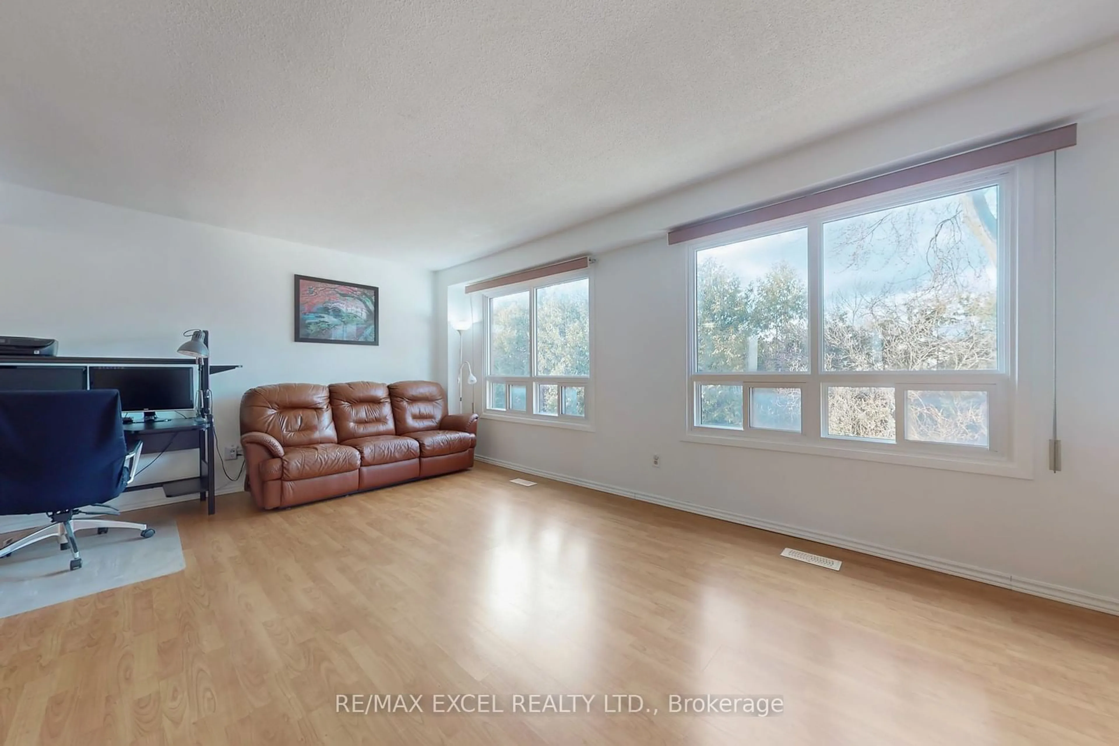 Living room with furniture, unknown for 24 Fundy Bay Blvd #76, Toronto Ontario M1W 3A4