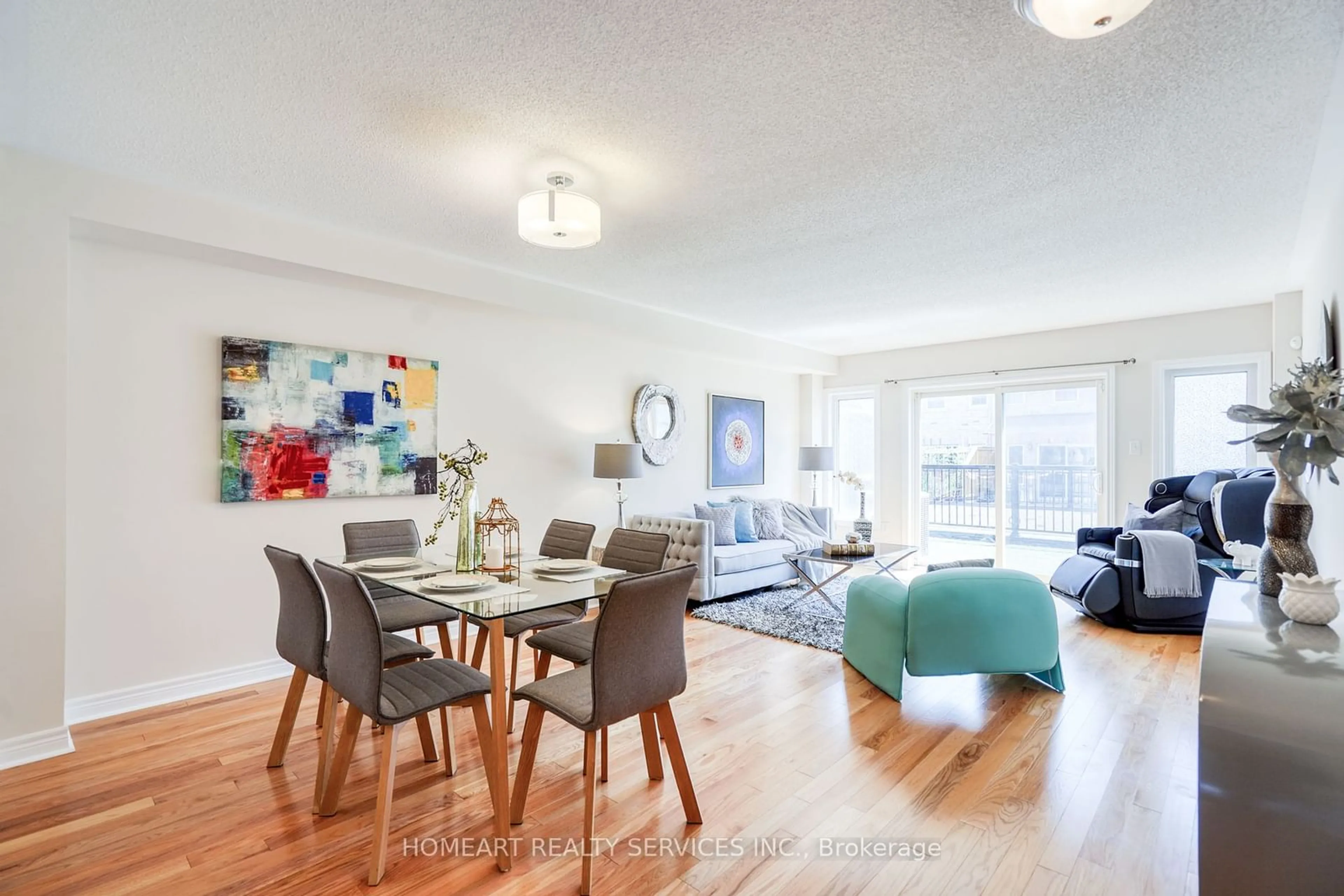 Living room with furniture, wood/laminate floor for 1035 Ellesmere Rd, Toronto Ontario M1P 2X1