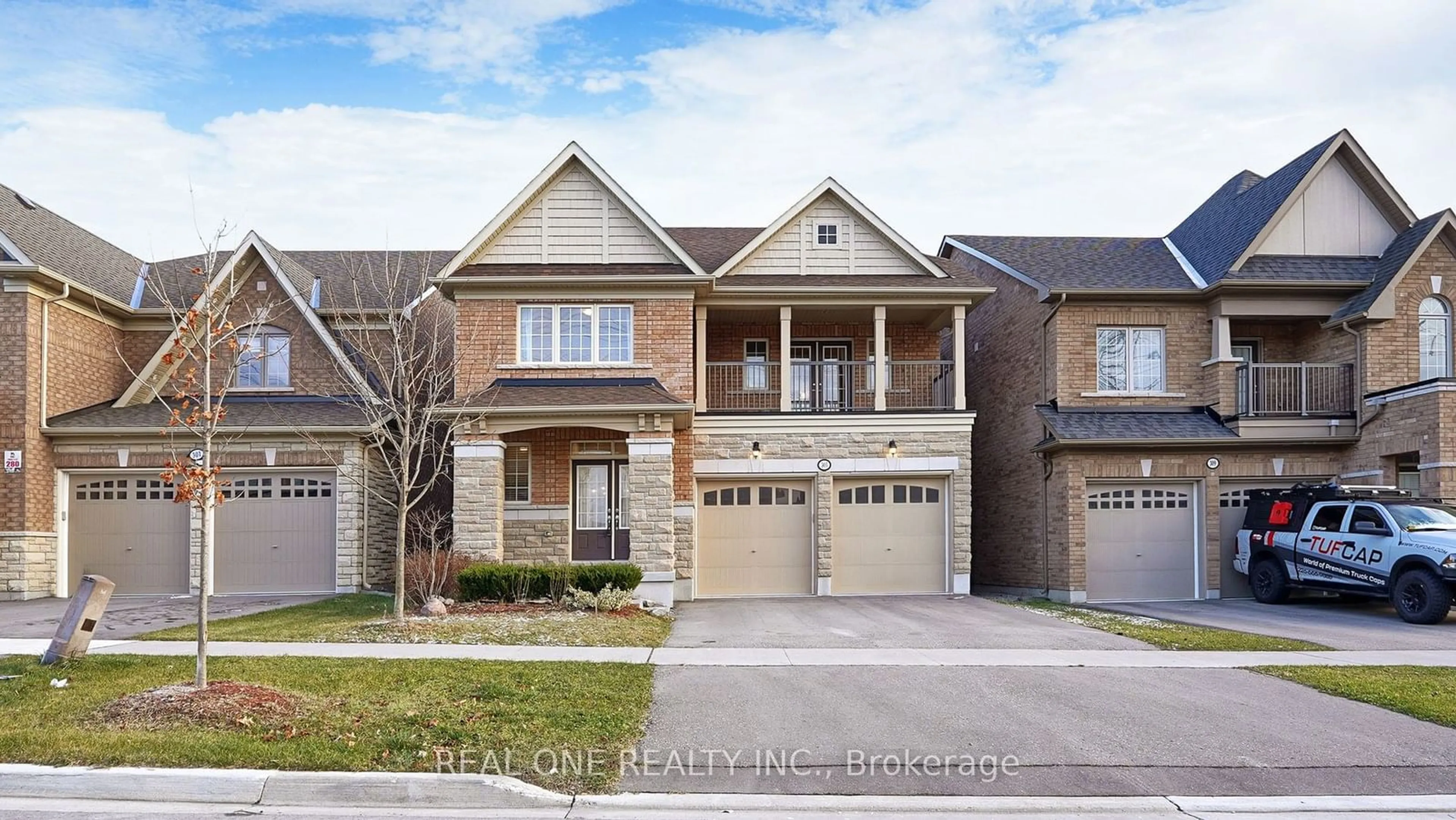 Home with brick exterior material, street for 305 Windfields Farm Dr, Oshawa Ontario L1L 0M2