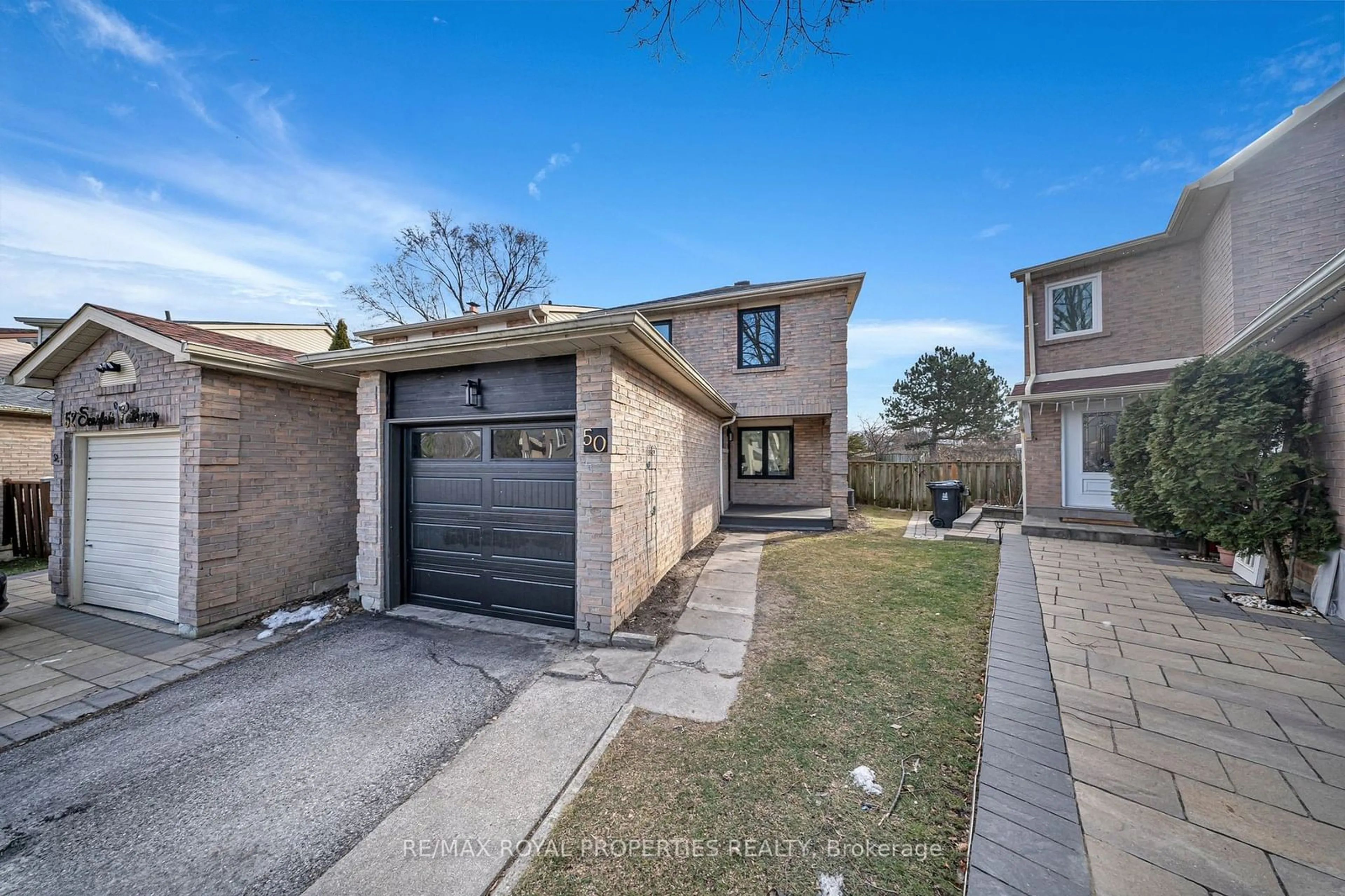 Home with brick exterior material, street for 50 Scarfair Ptwy, Toronto Ontario M1B 4G2