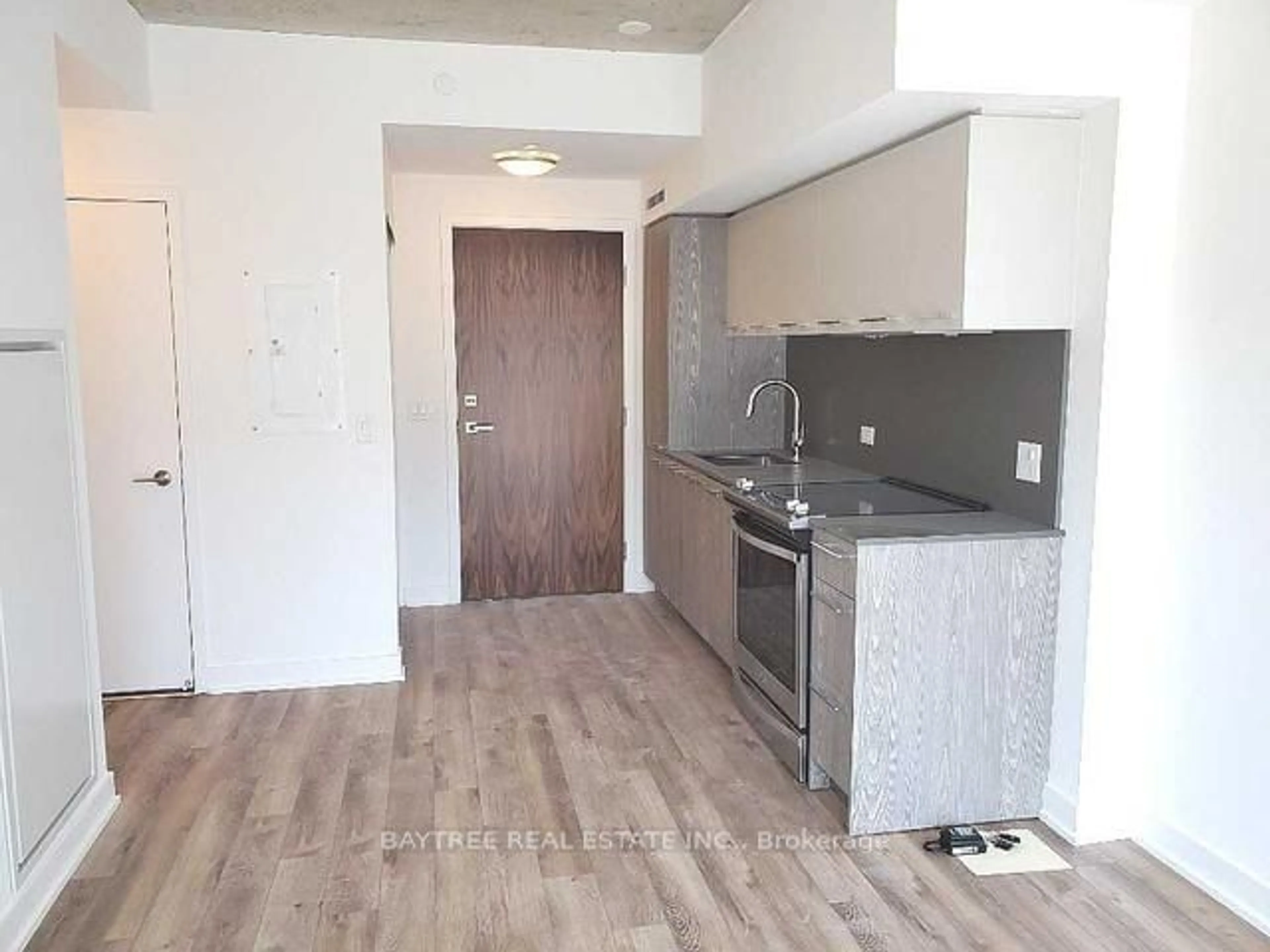 Standard kitchen, wood/laminate floor for 30 Baseball Pl #912, Toronto Ontario M4M 0E8