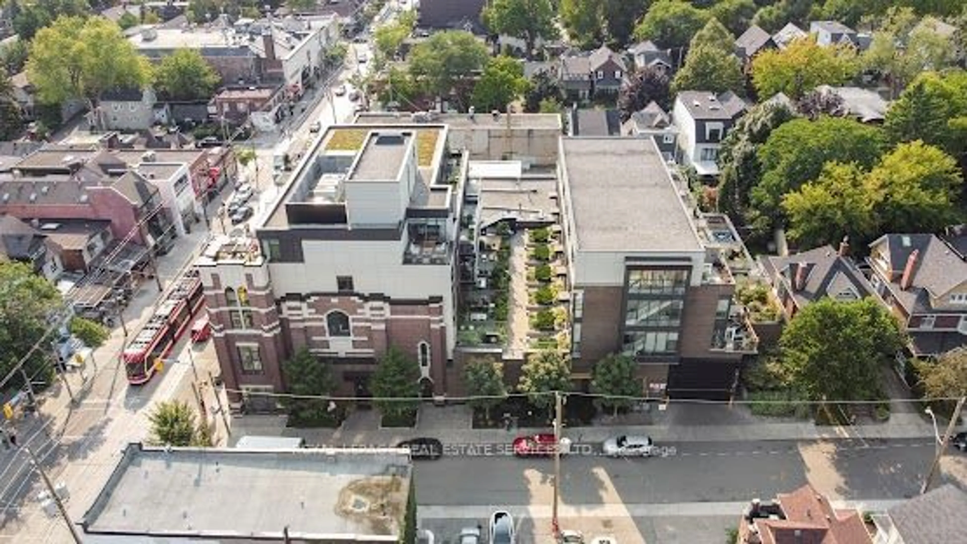 A pic from outside/outdoor area/front of a property/back of a property/a pic from drone, city buildings view from balcony for 2 Bellefair Ave #208, Toronto Ontario M4L 3T8