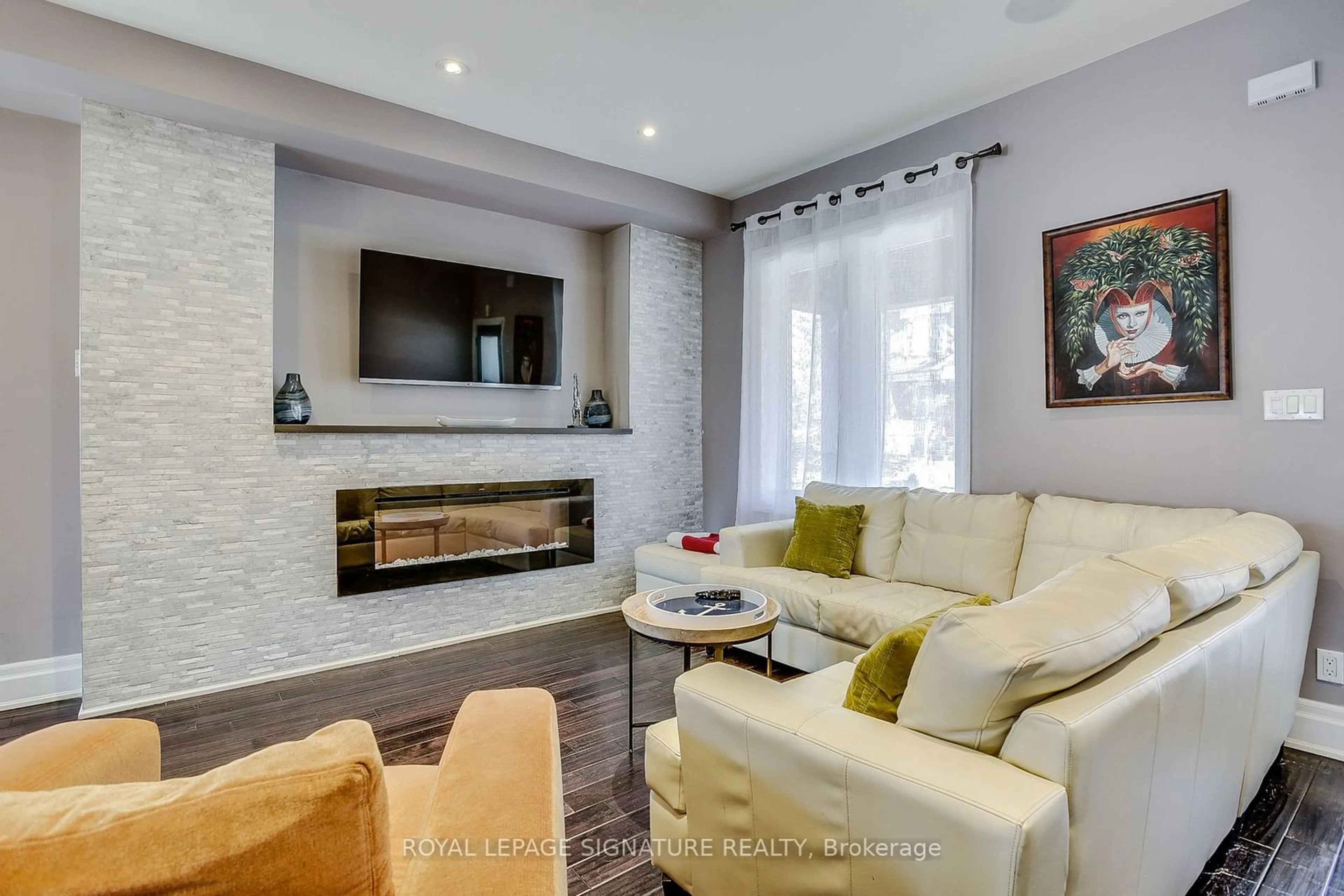 Living room with furniture, ceramic/tile floor for 235 Bain Ave, Toronto Ontario M4K 1G2