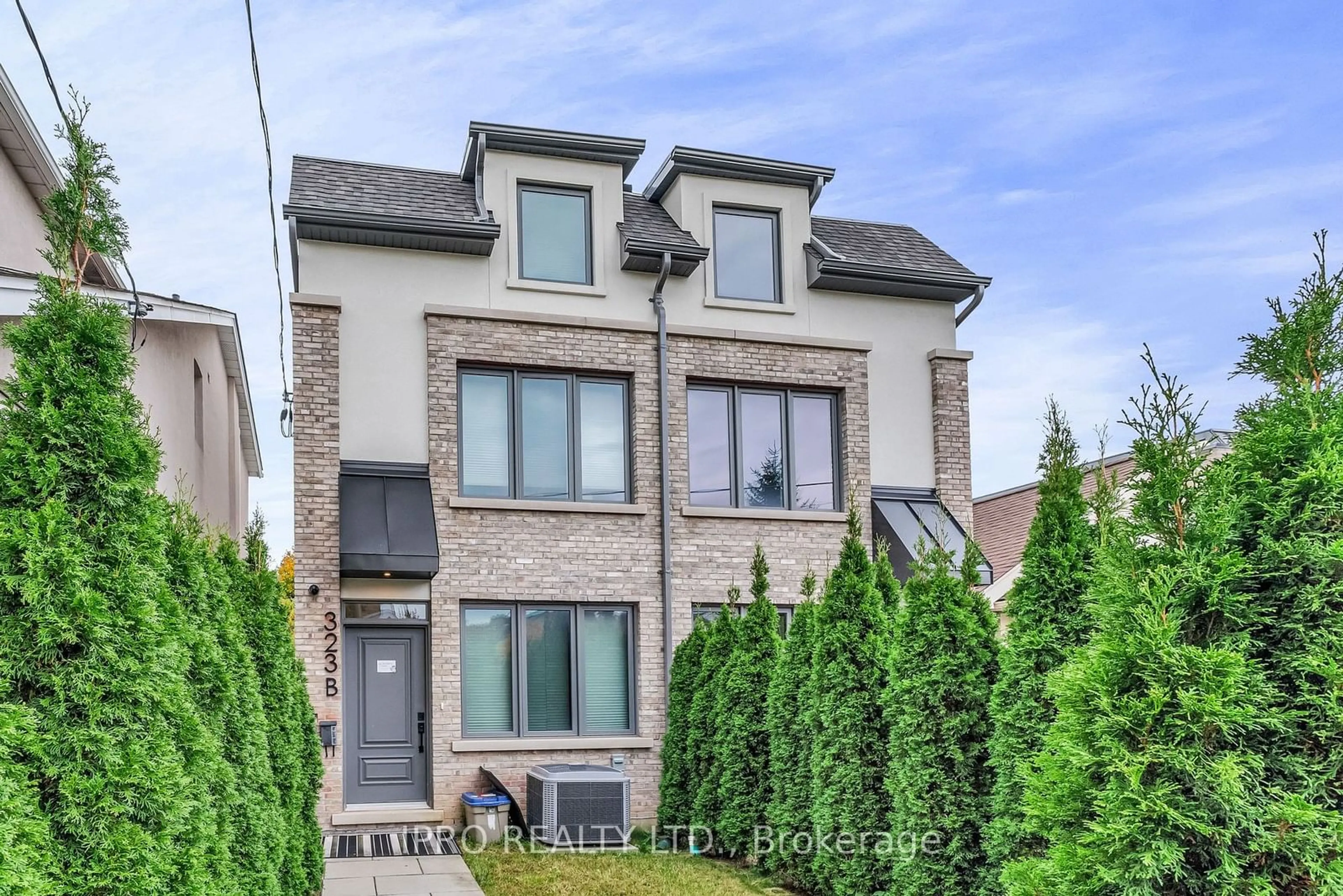 Home with brick exterior material, street for 323 Mortimer Ave, Toronto Ontario M4J 2C9