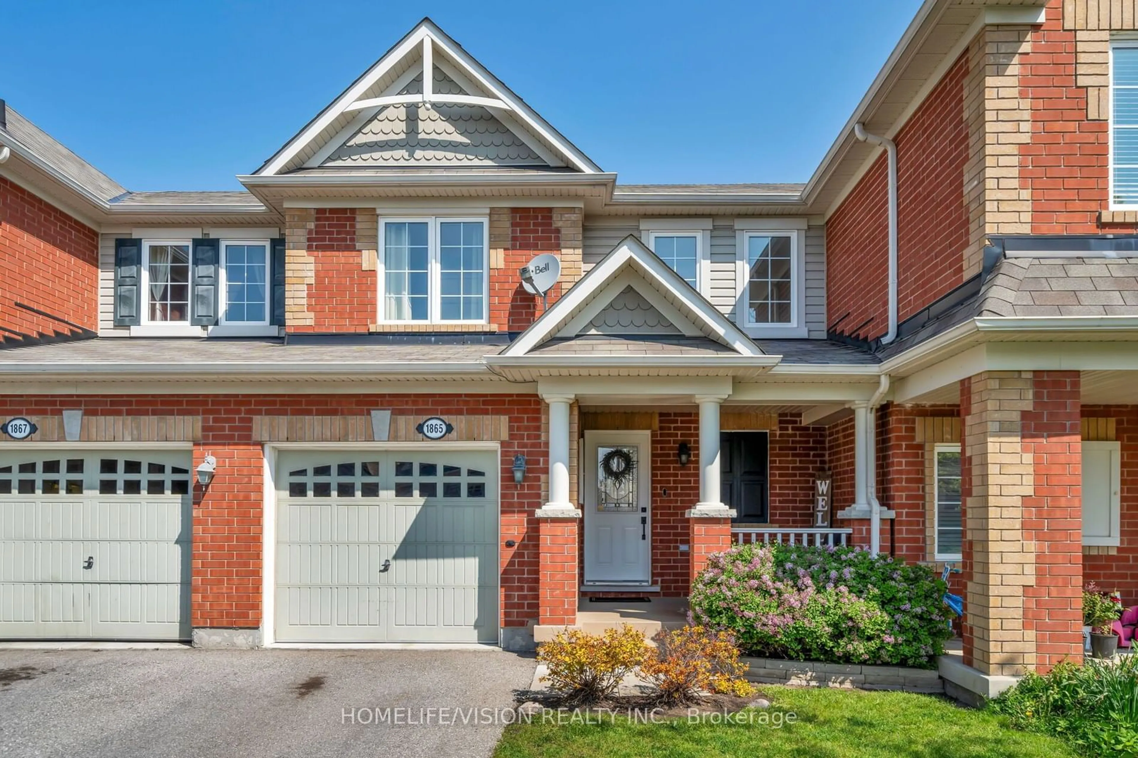 Home with brick exterior material, street for 1865 Liatris Dr, Pickering Ontario L1X 0A4