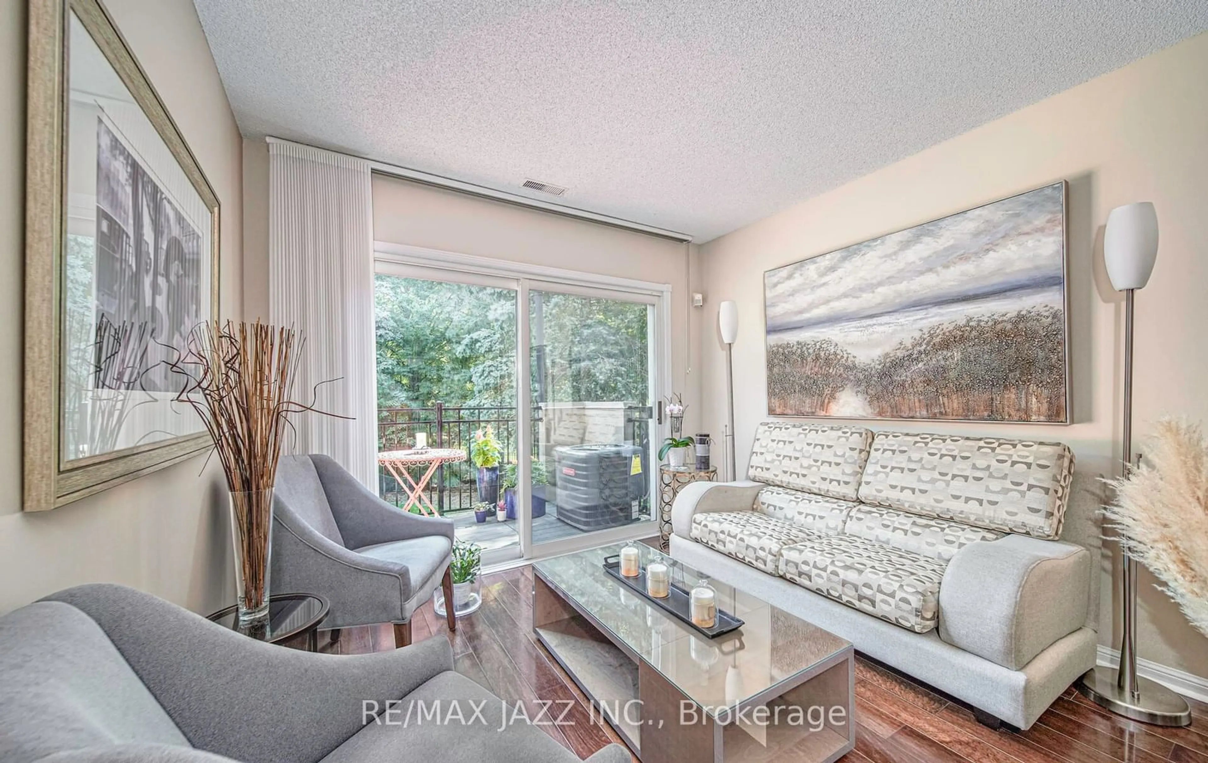 Living room with furniture, wood/laminate floor for 1400 The Esplanade #315, Pickering Ontario L1V 6V2