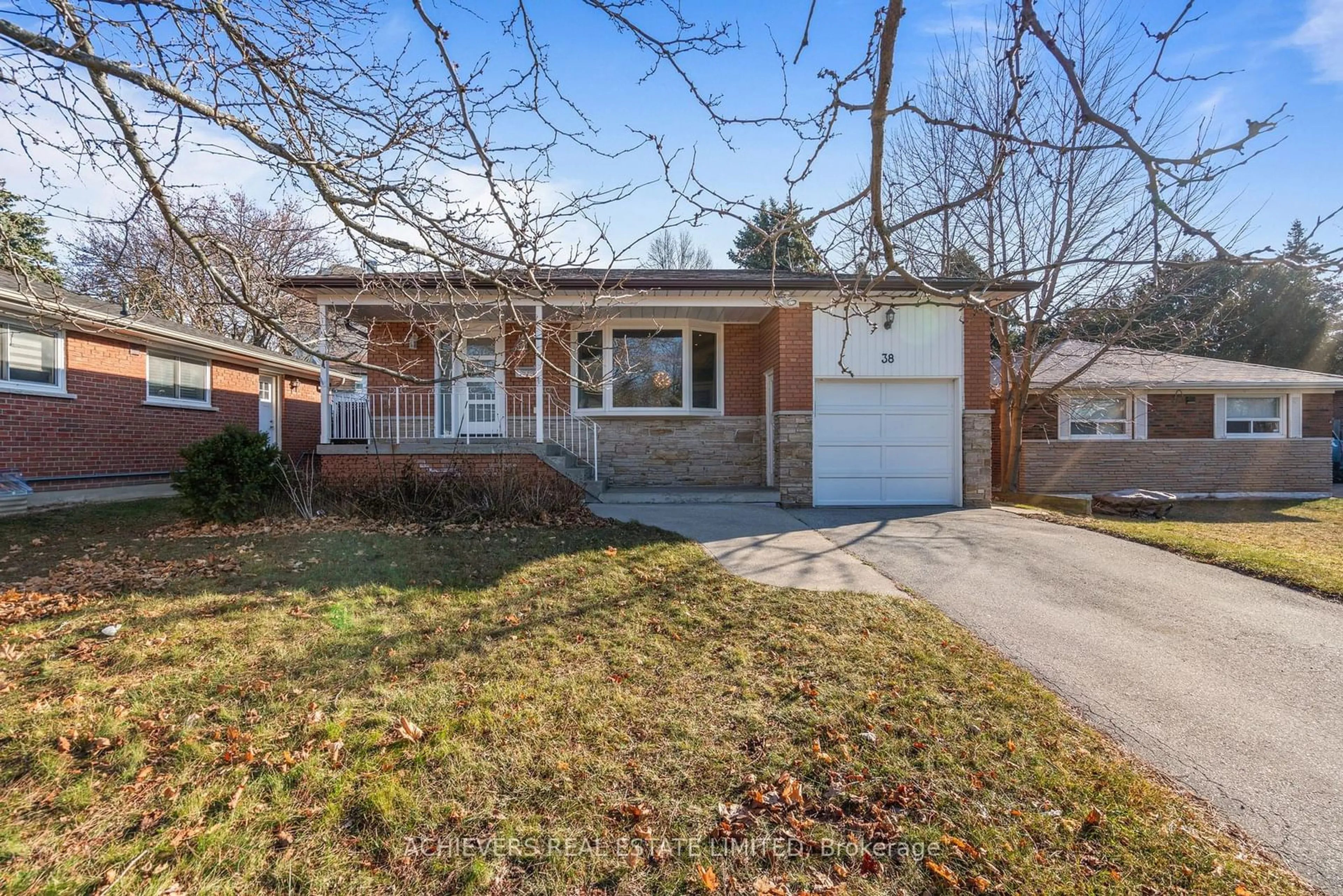 Home with brick exterior material, street for 38 Purpledusk Tr, Toronto Ontario M1E 4C8