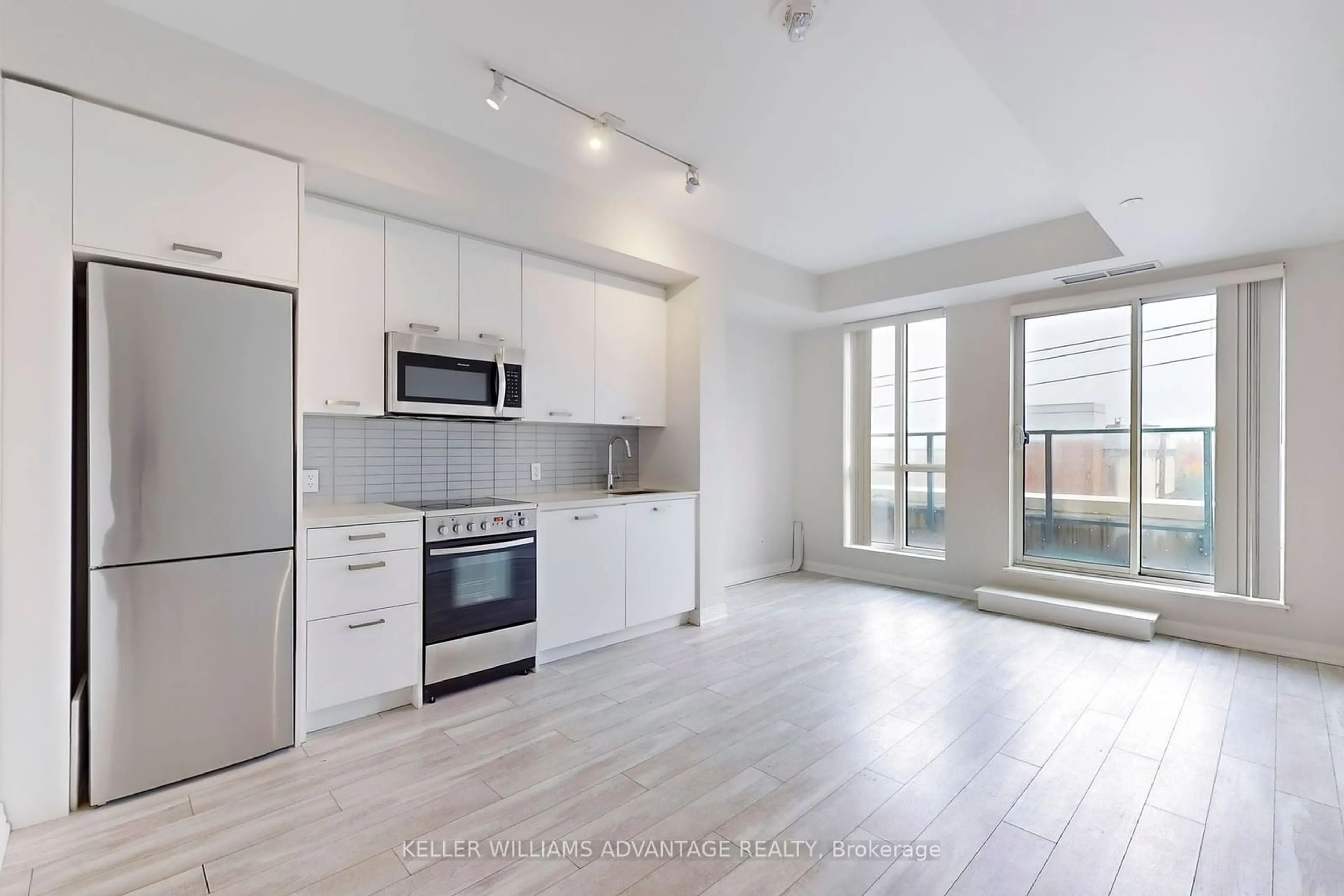 Open concept kitchen, unknown for 1630 Queen St #406, Toronto Ontario M4L 0B3