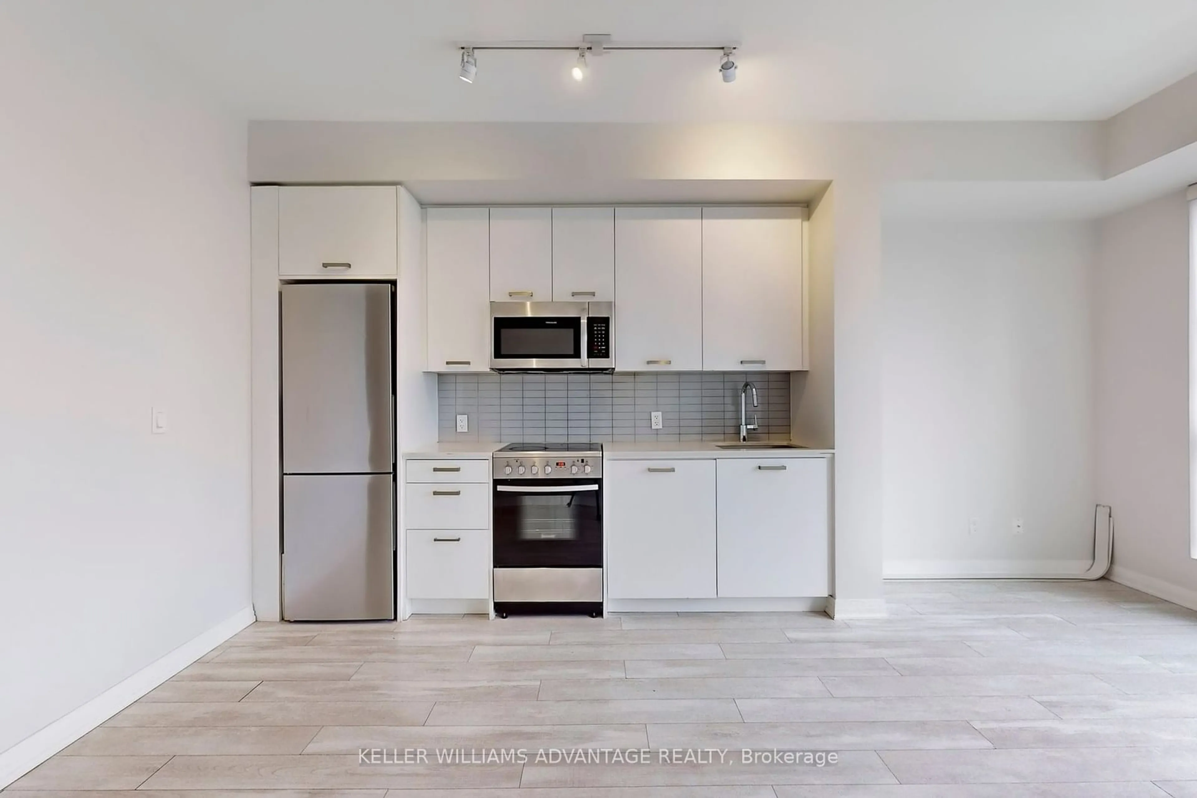 Open concept kitchen, unknown for 1630 Queen St #406, Toronto Ontario M4L 0B3