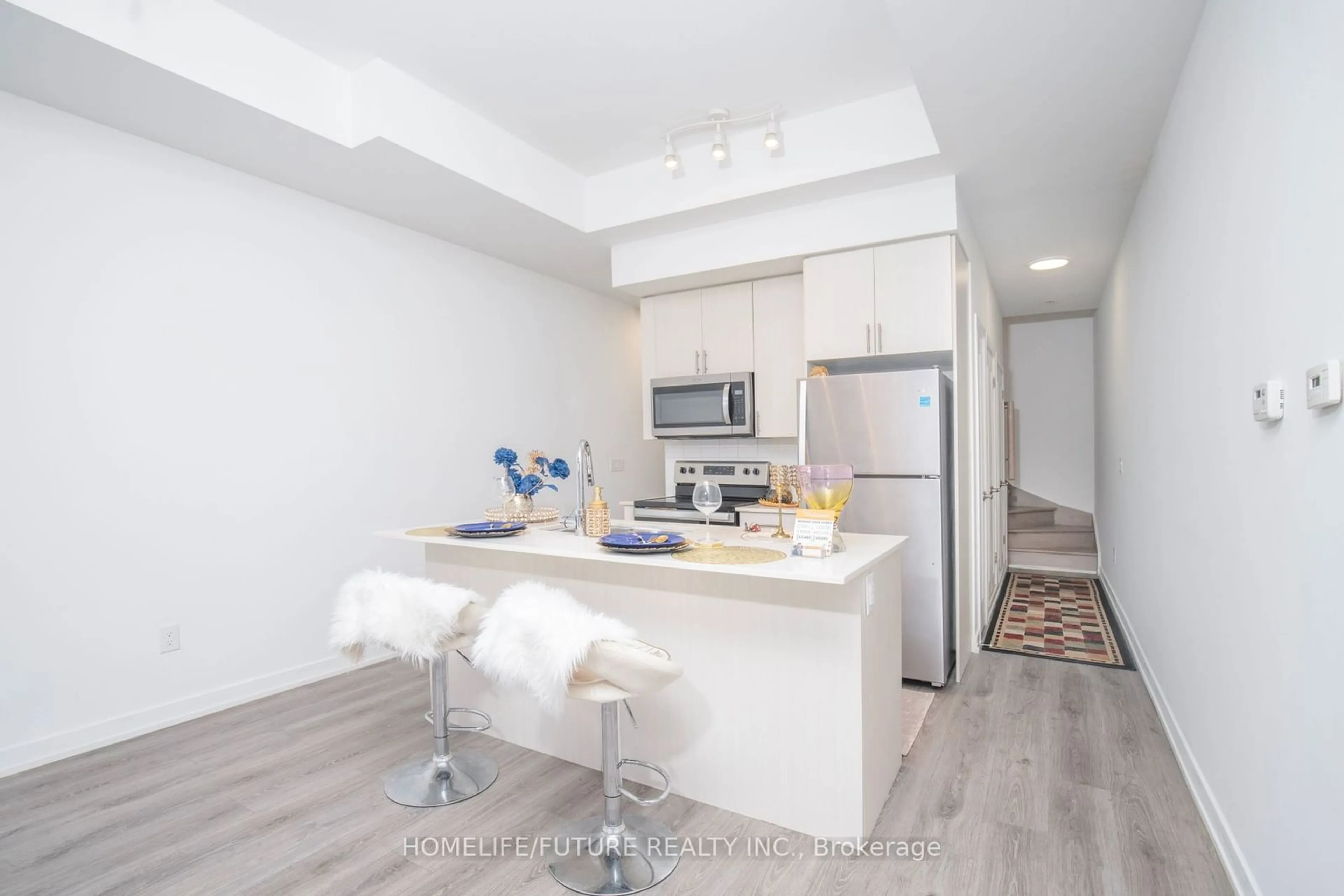 Open concept kitchen, unknown for 3686 St Clair Ave #105, Toronto Ontario M1M 0E4