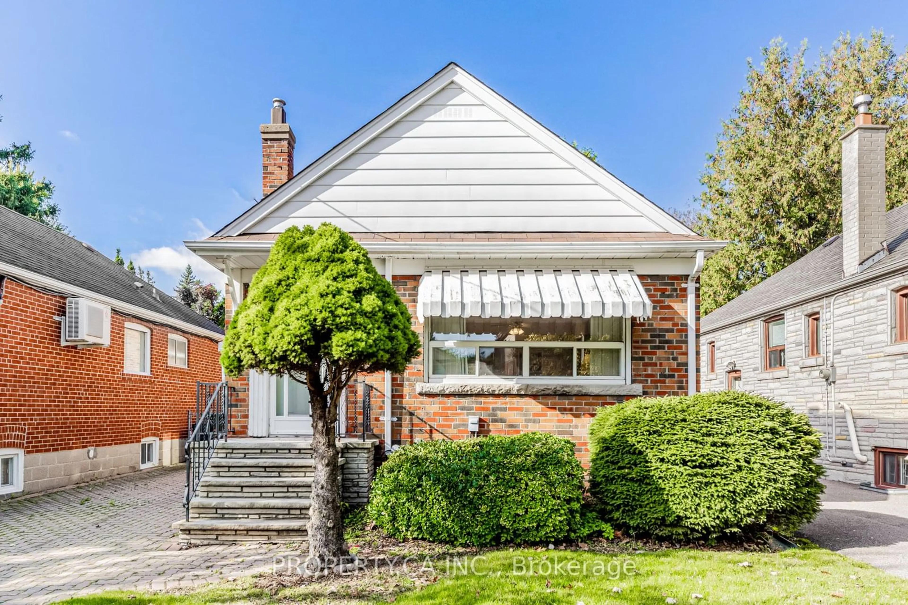 Home with brick exterior material, street for 82 Cedarcrest Blvd, Toronto Ontario M4B 2P3