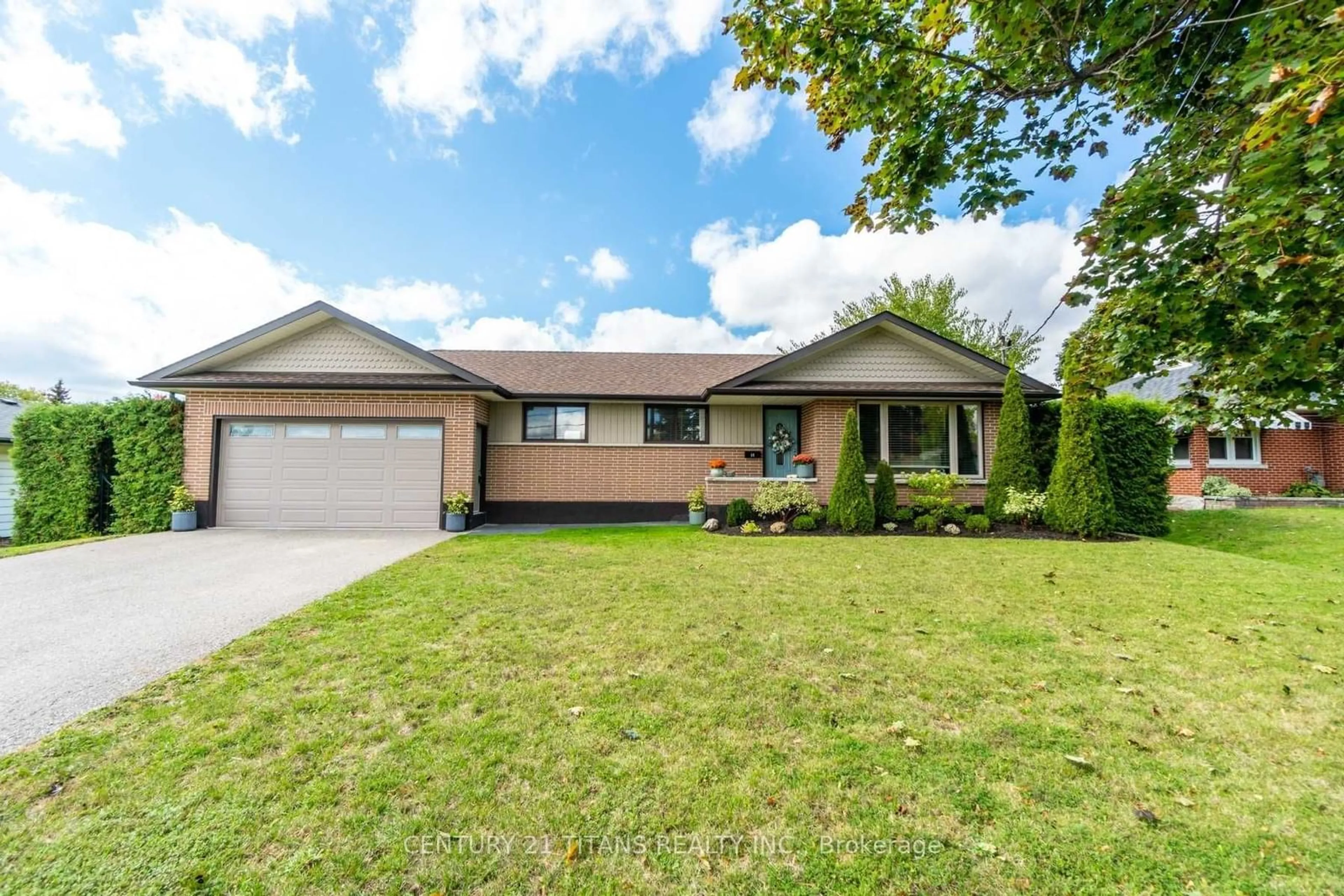 Home with brick exterior material, street for 14 Darlington Blvd, Clarington Ontario L1E 2J7