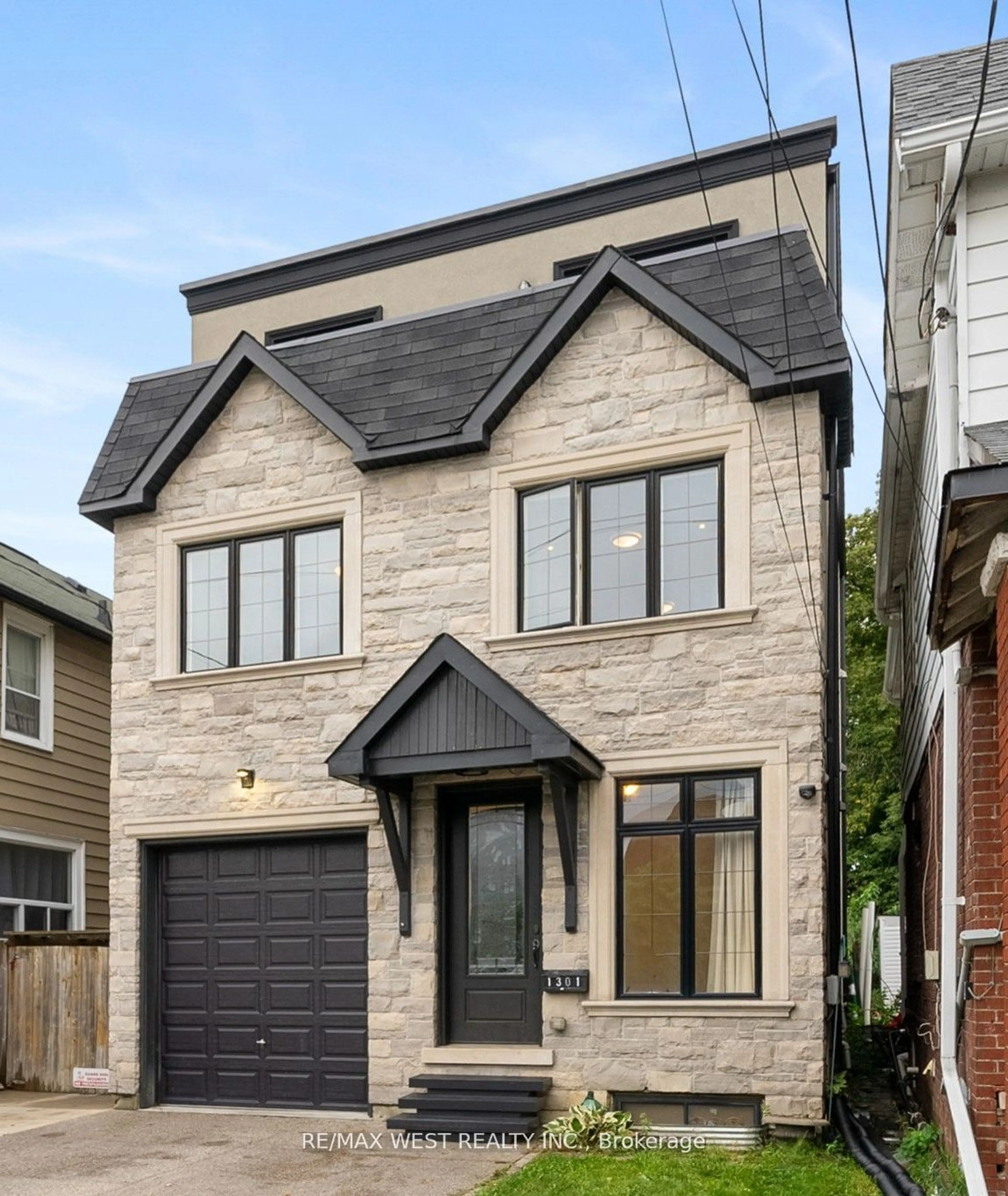 Home with brick exterior material, street for 1301 Woodbine Ave, Toronto Ontario M4C 4E8