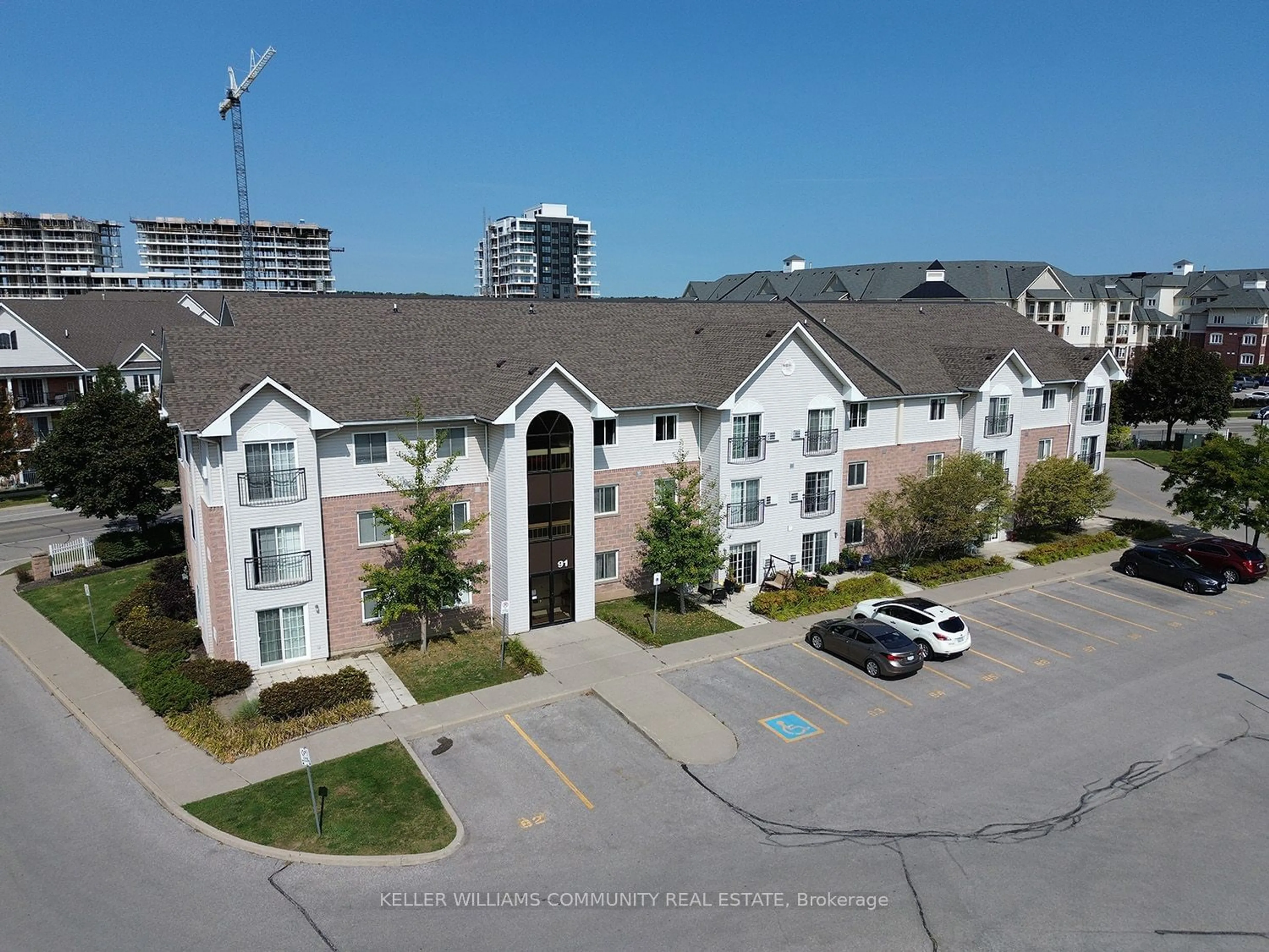 A pic from outside/outdoor area/front of a property/back of a property/a pic from drone, city buildings view from balcony for 91 Aspen Springs Dr #301, Clarington Ontario L1C 5J9