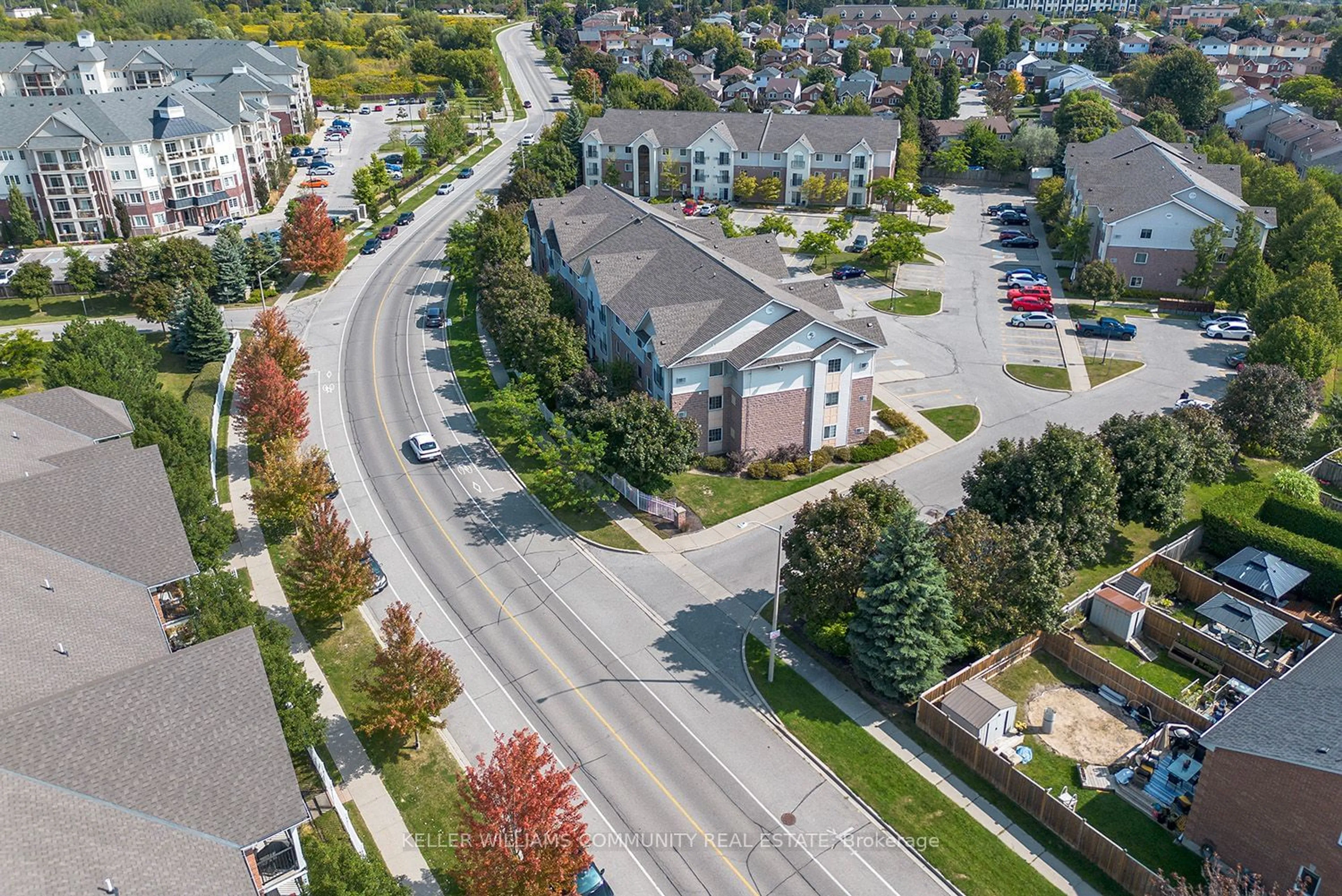 A pic from outside/outdoor area/front of a property/back of a property/a pic from drone, street for 91 Aspen Springs Dr #301, Clarington Ontario L1C 5J9