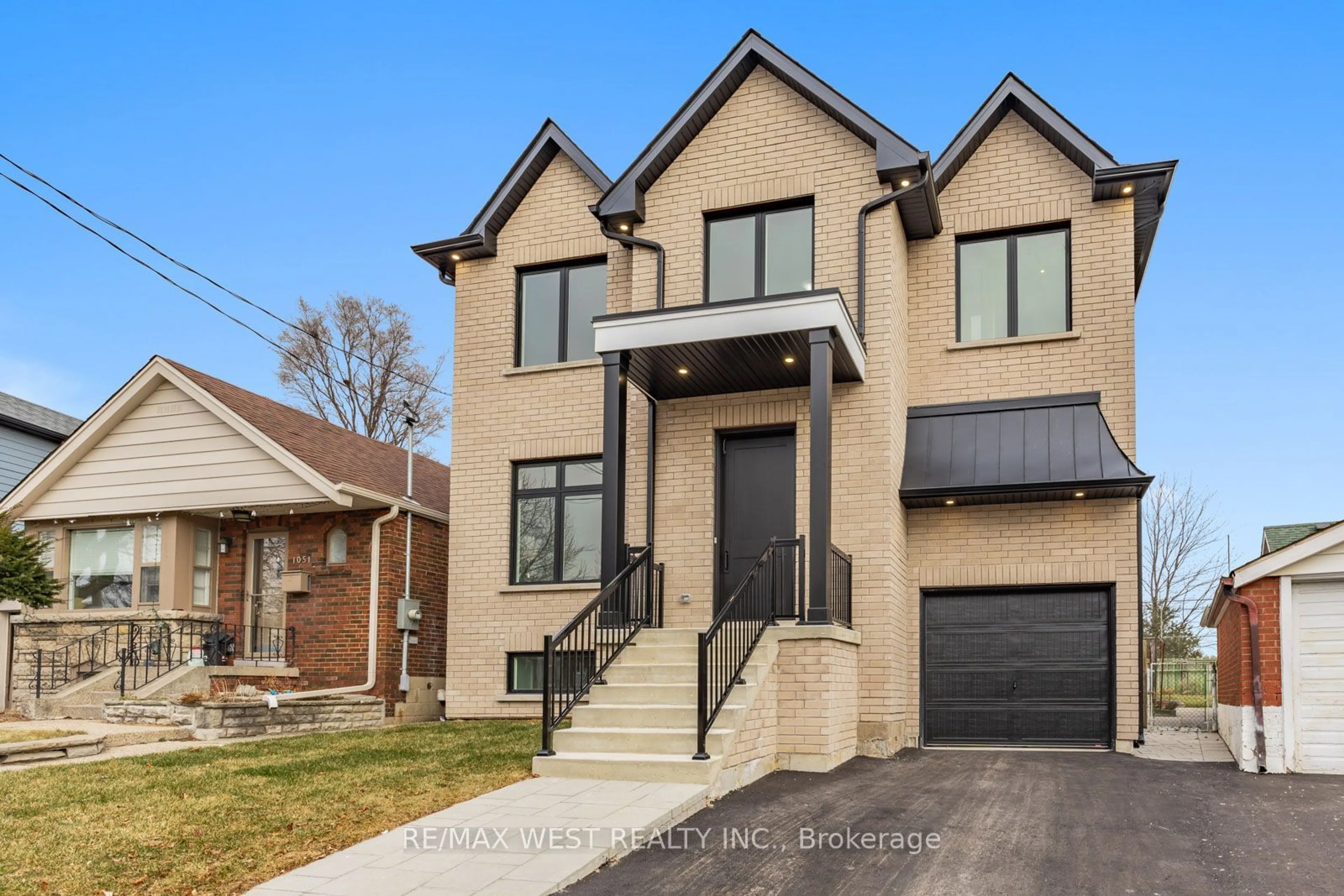 Home with brick exterior material, street for 1049 Greenwood Ave, Toronto Ontario M4J 4E2