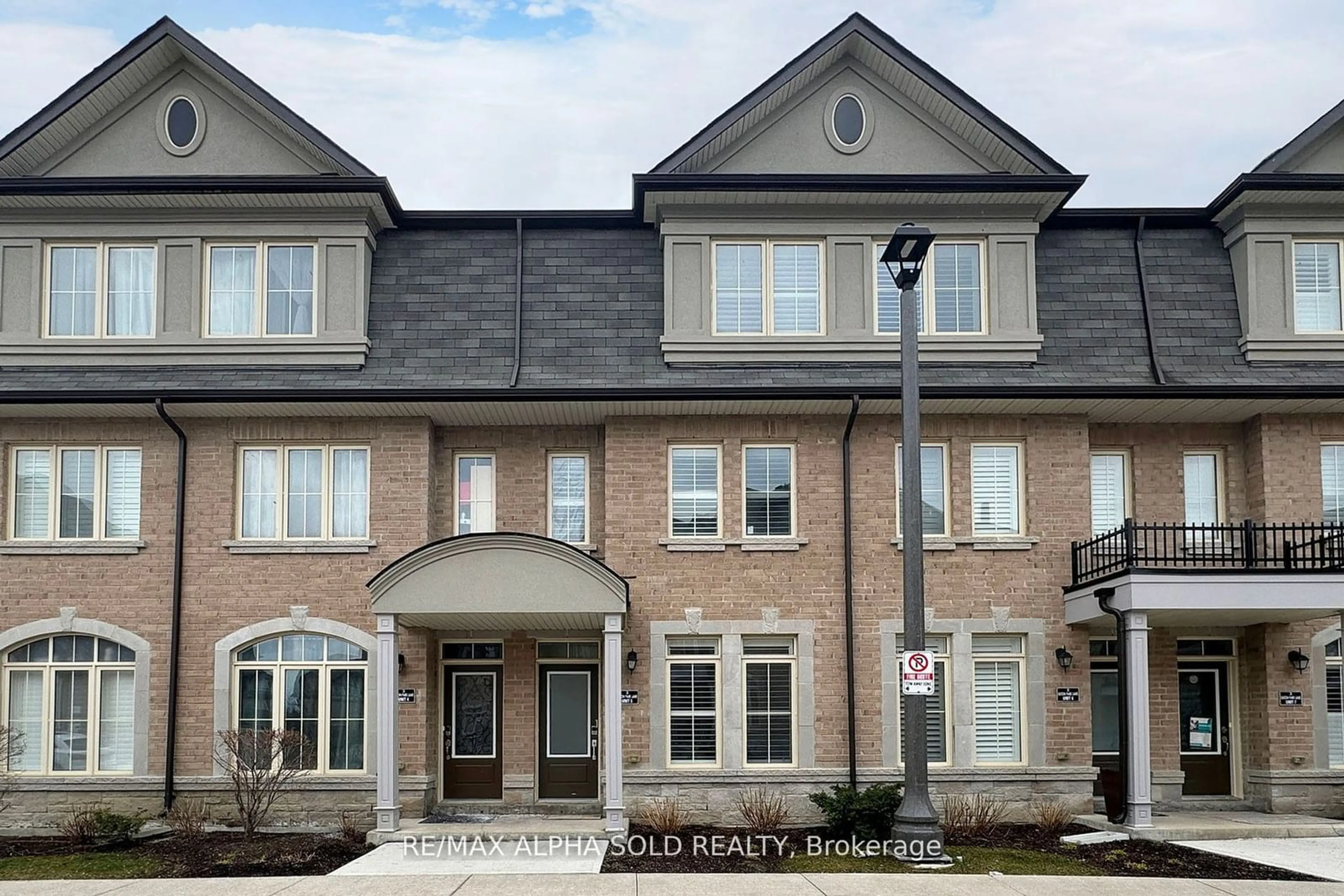 Home with brick exterior material, street for 3 Eaton Park Lane #5, Toronto Ontario M1W 0A5