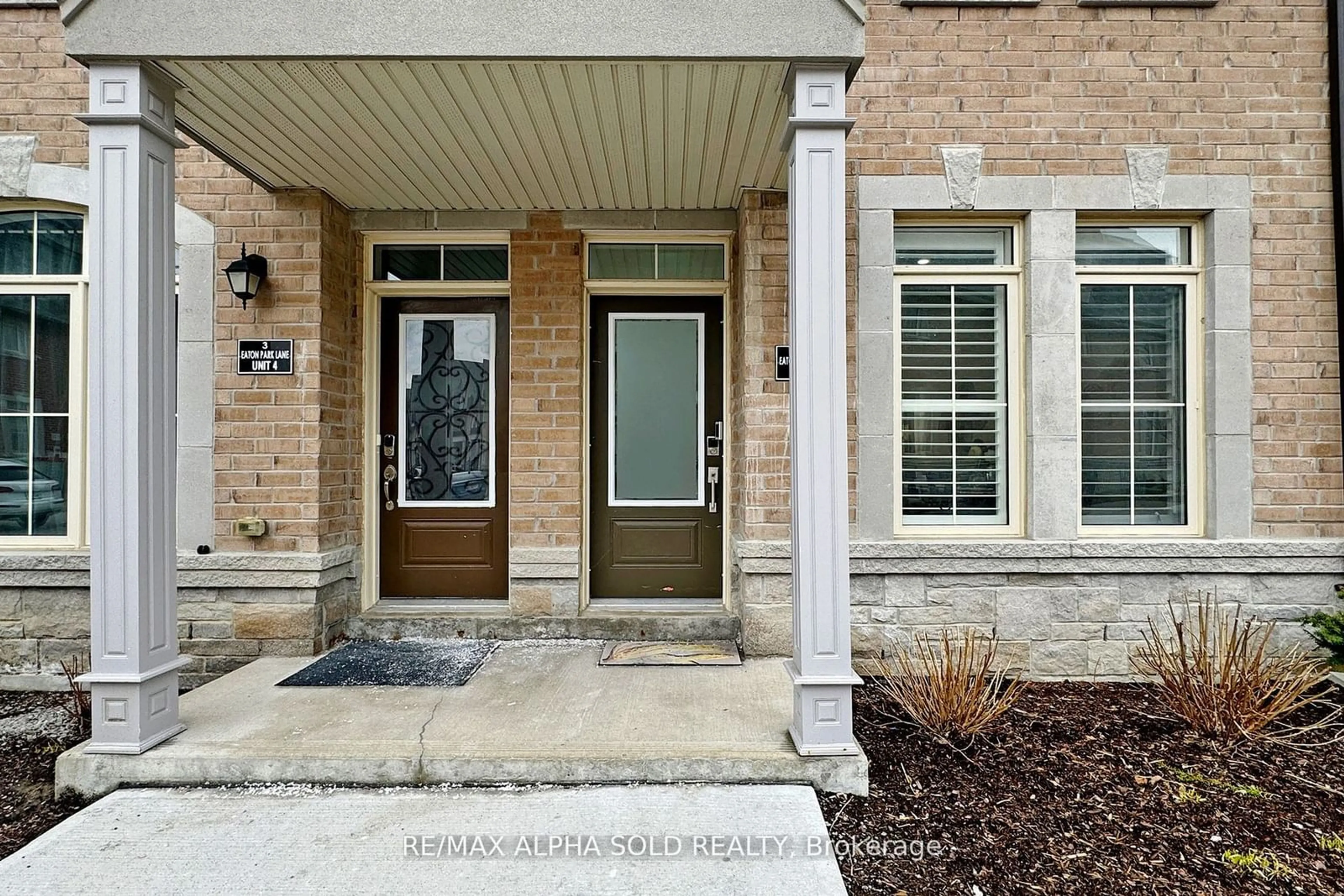 Home with brick exterior material, street for 3 Eaton Park Lane #5, Toronto Ontario M1W 0A5