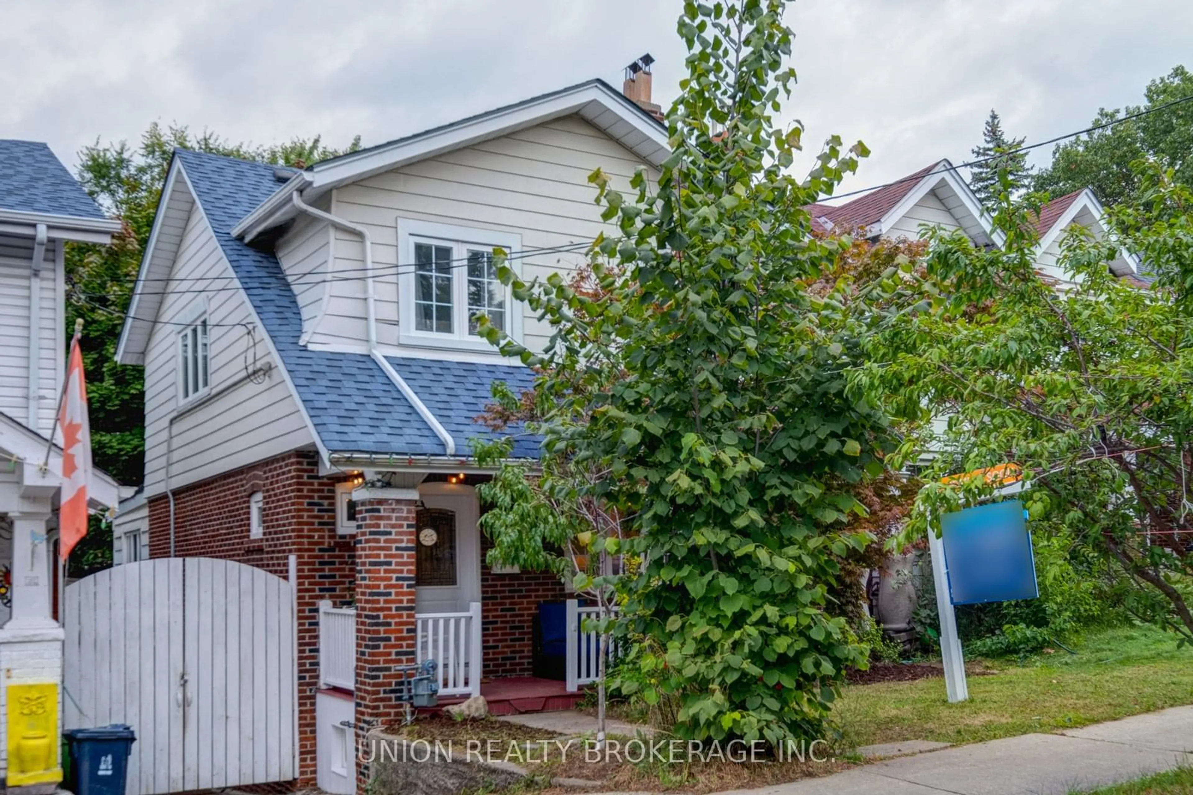 Home with brick exterior material, street for 528 Strathmore Blvd, Toronto Ontario M4C 1P1