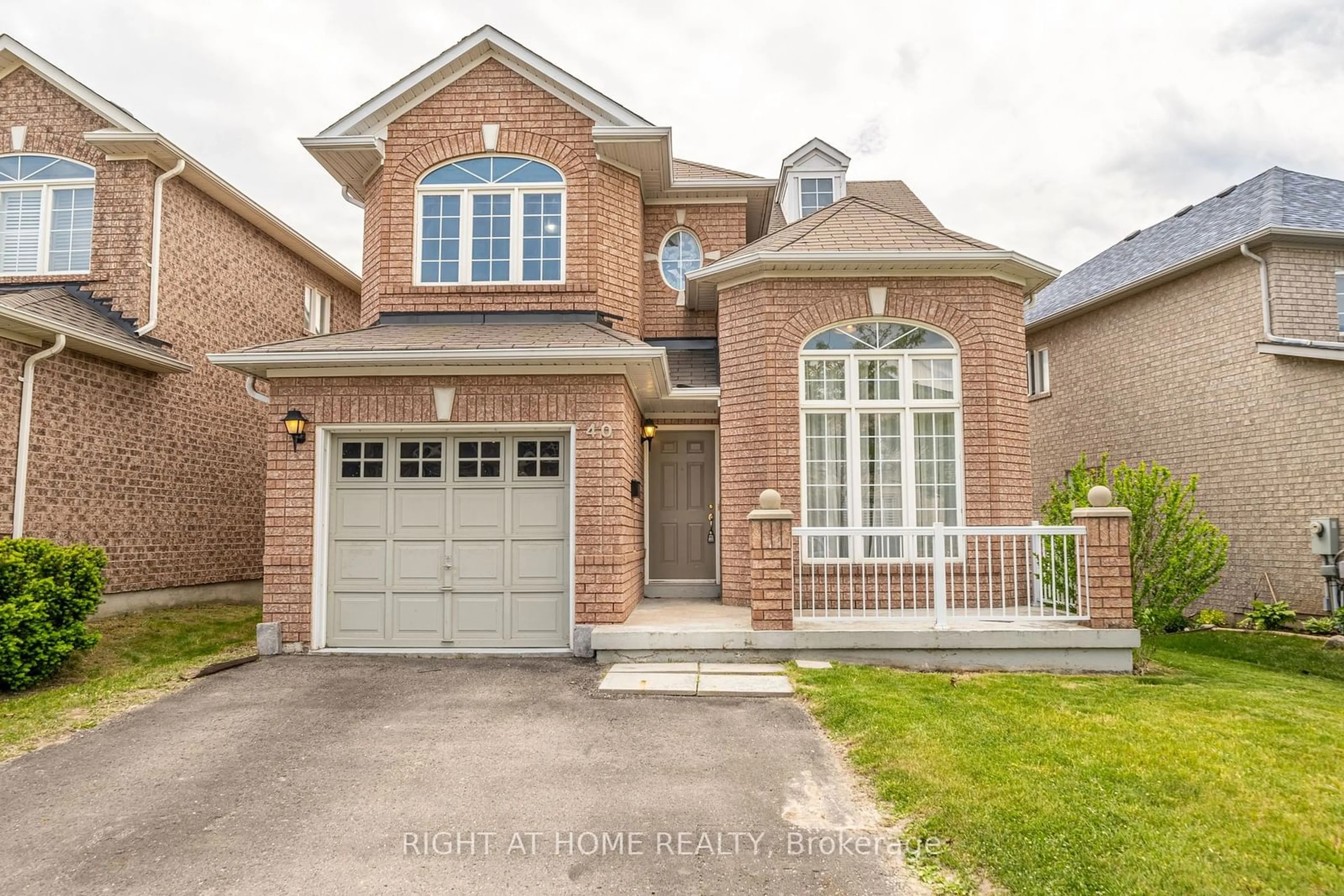 Home with brick exterior material, street for 40 Nobbs Dr, Ajax Ontario L1T 4L9