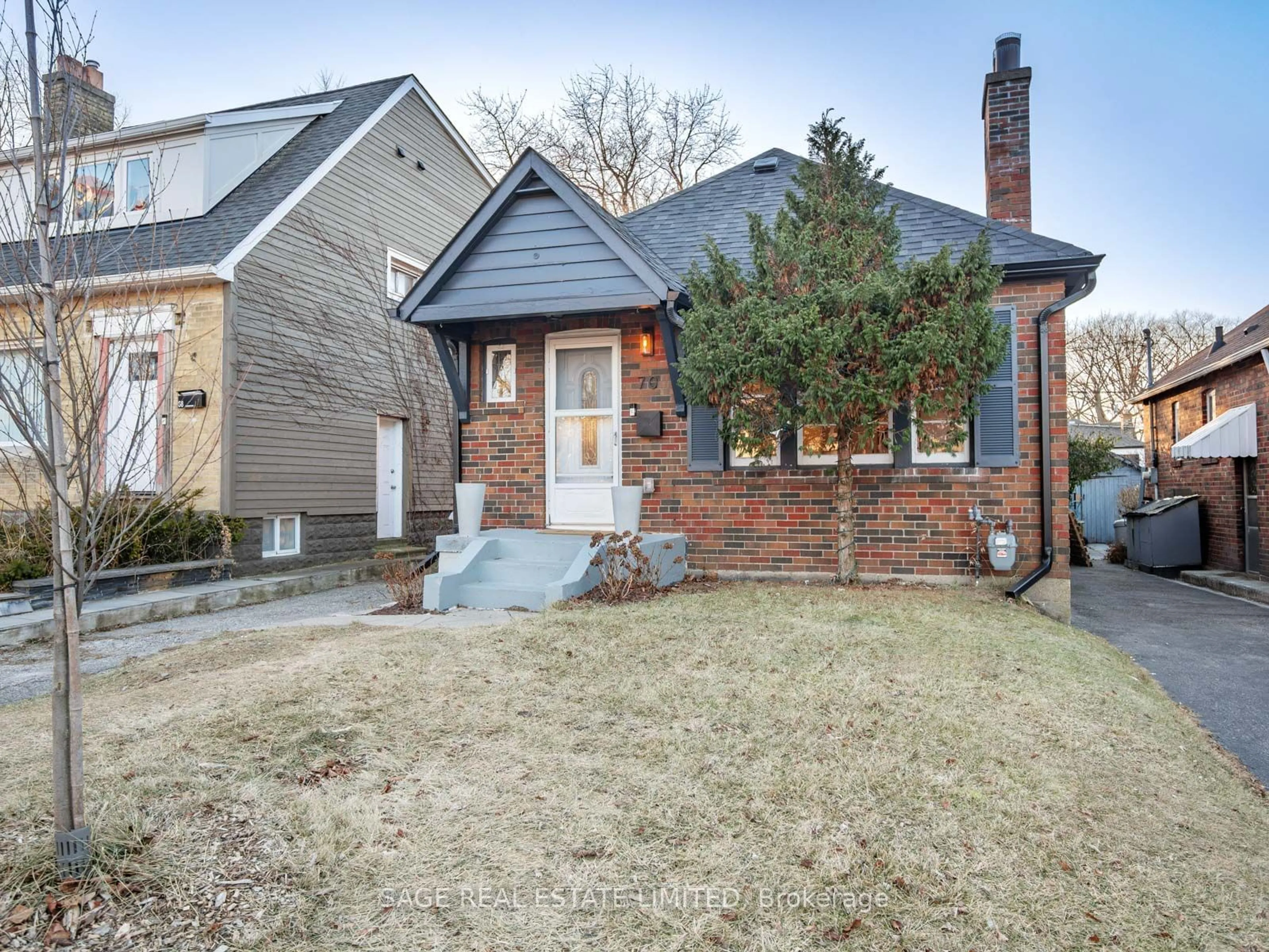 Home with brick exterior material, street for 70 Dunington Dr, Toronto Ontario M1N 3E3